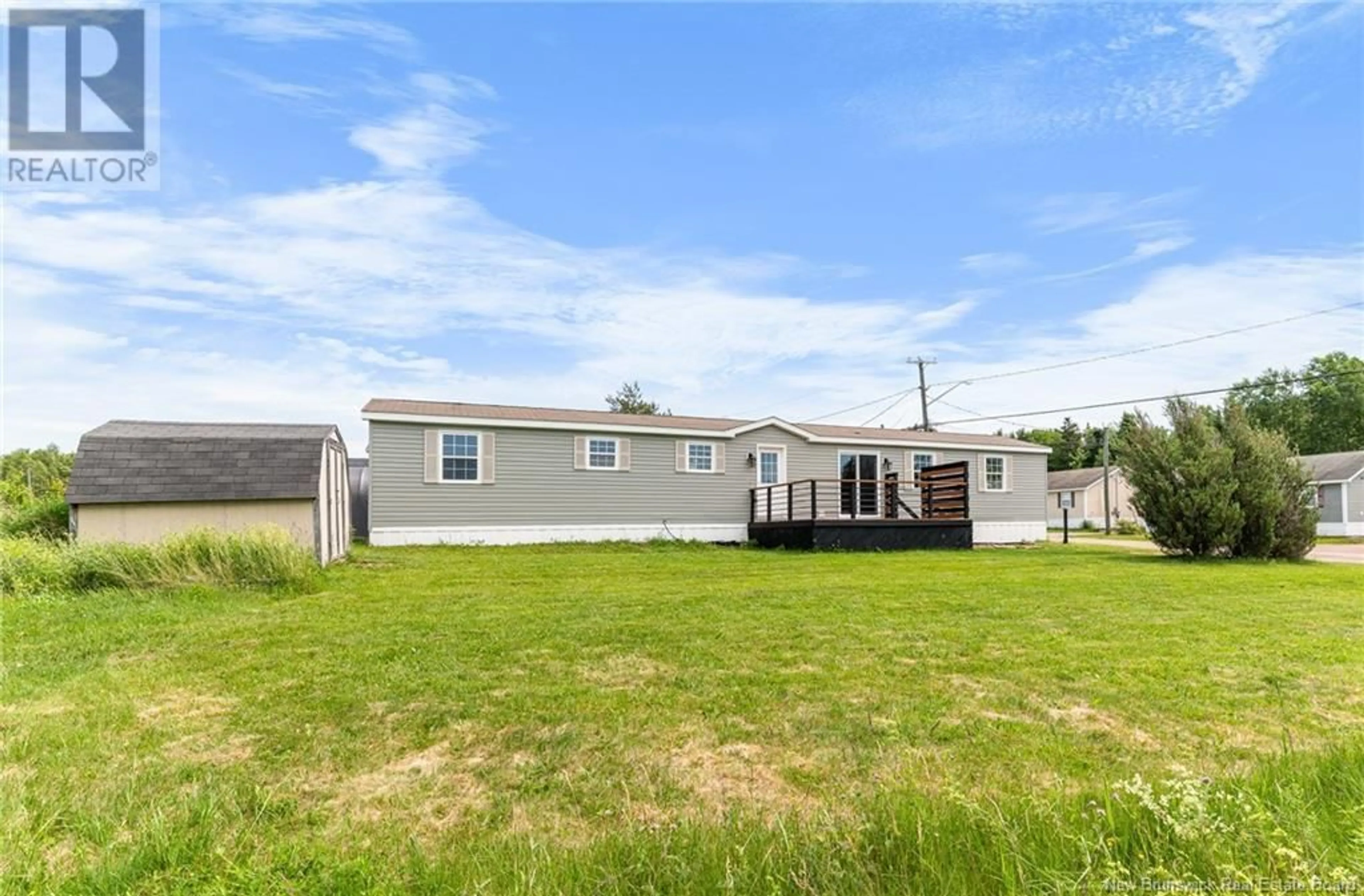 A pic from outside/outdoor area/front of a property/back of a property/a pic from drone, unknown for 202 ULYSSE, Dover New Brunswick E1A7X5