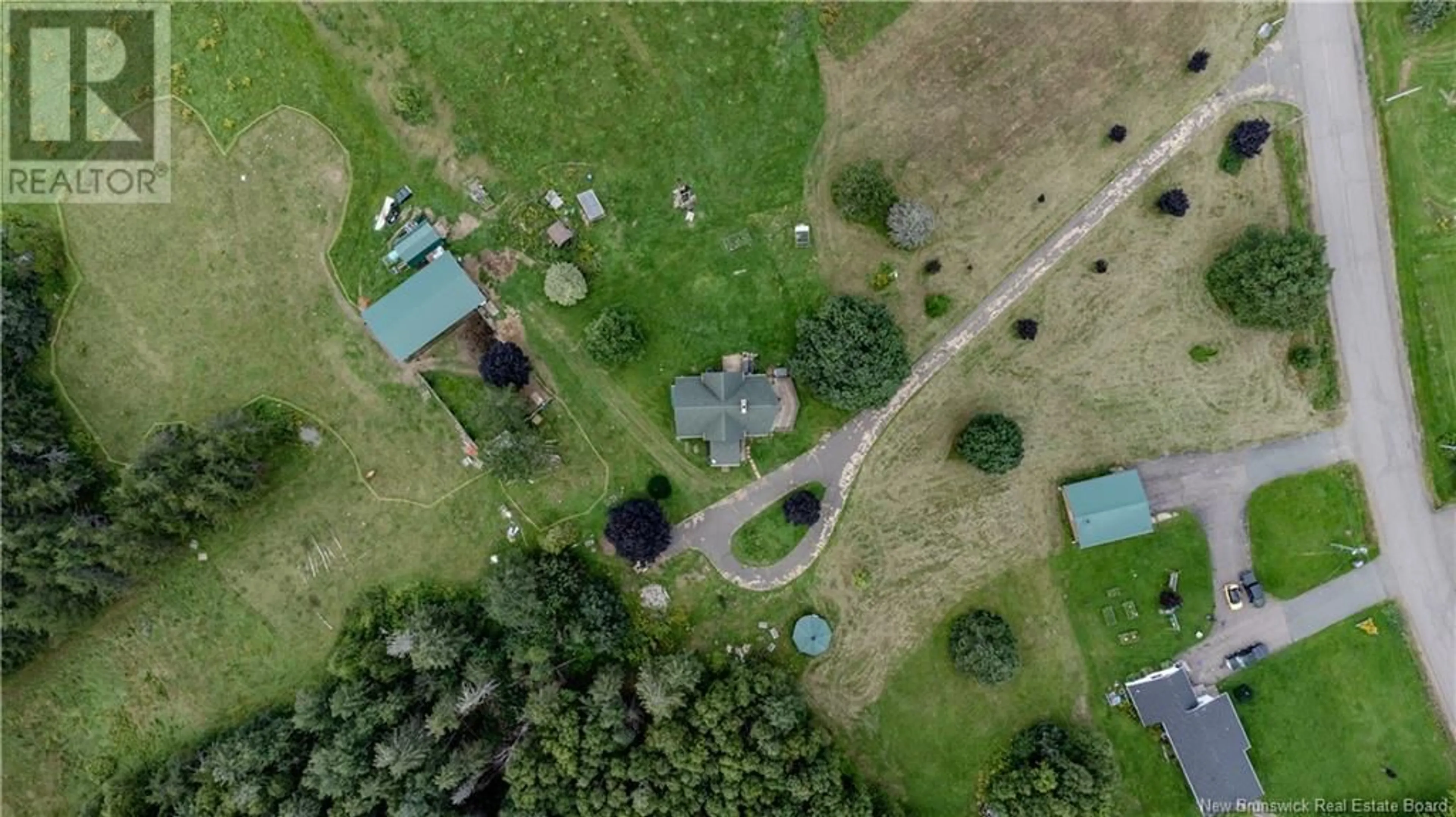 A pic from outside/outdoor area/front of a property/back of a property/a pic from drone, forest/trees view for 1163 ROUTE 465, Clairville New Brunswick E4T2K9