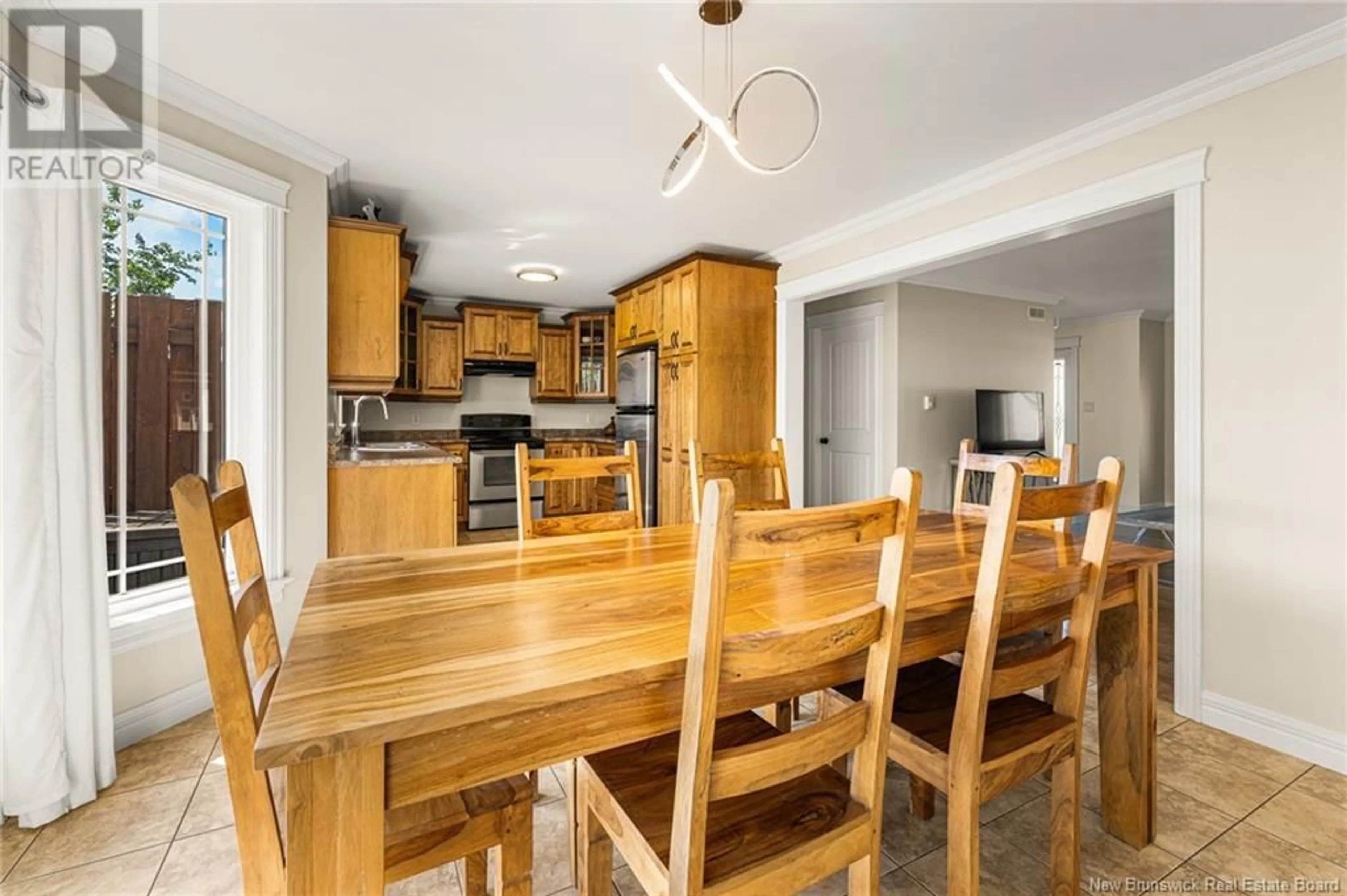 Open concept kitchen, wood/laminate floor for 59 TANYA CRESCENT, Moncton New Brunswick E1E4V3