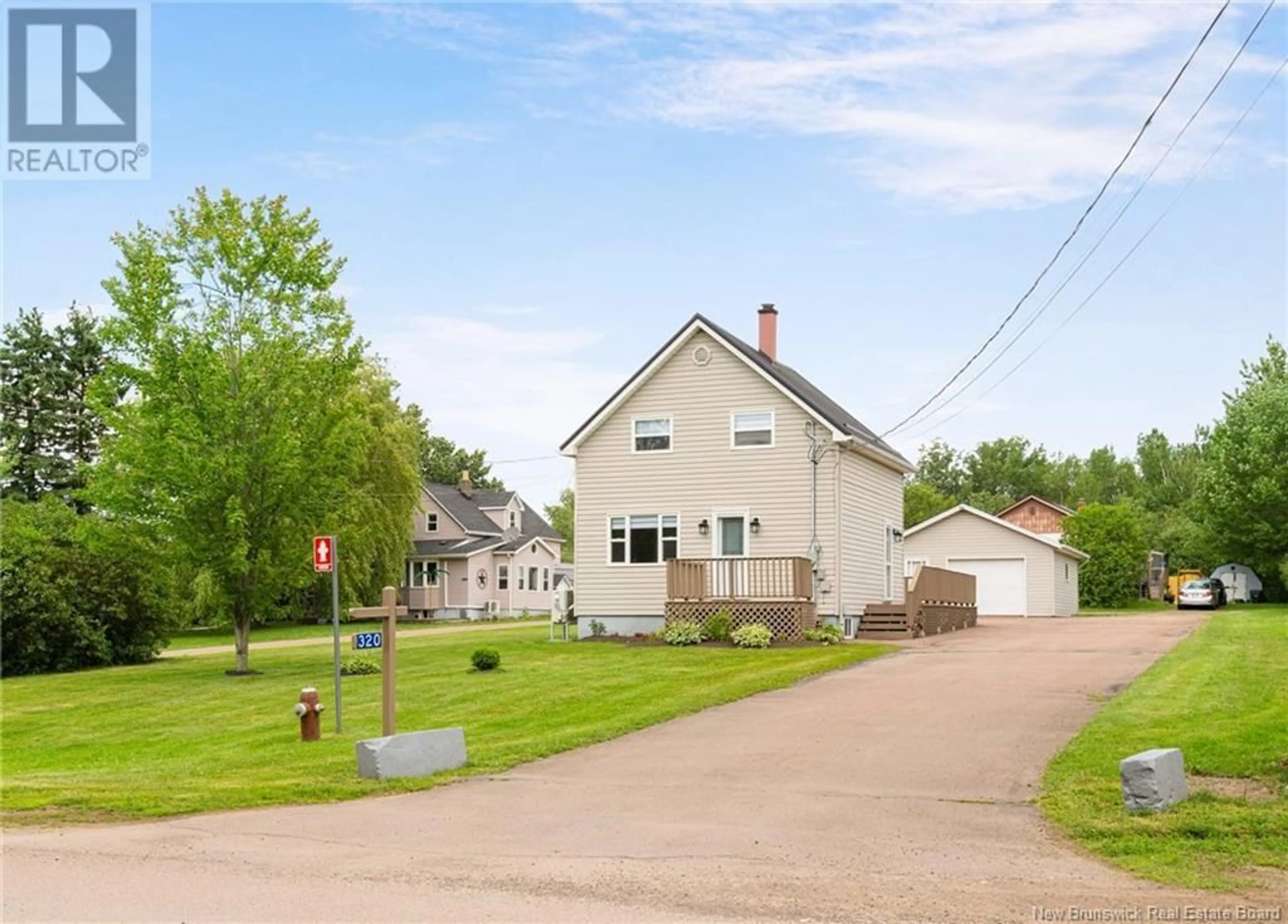 A pic from outside/outdoor area/front of a property/back of a property/a pic from drone, street for 320 RIVERSIDE PROMENADE, Shediac New Brunswick E4P2P7