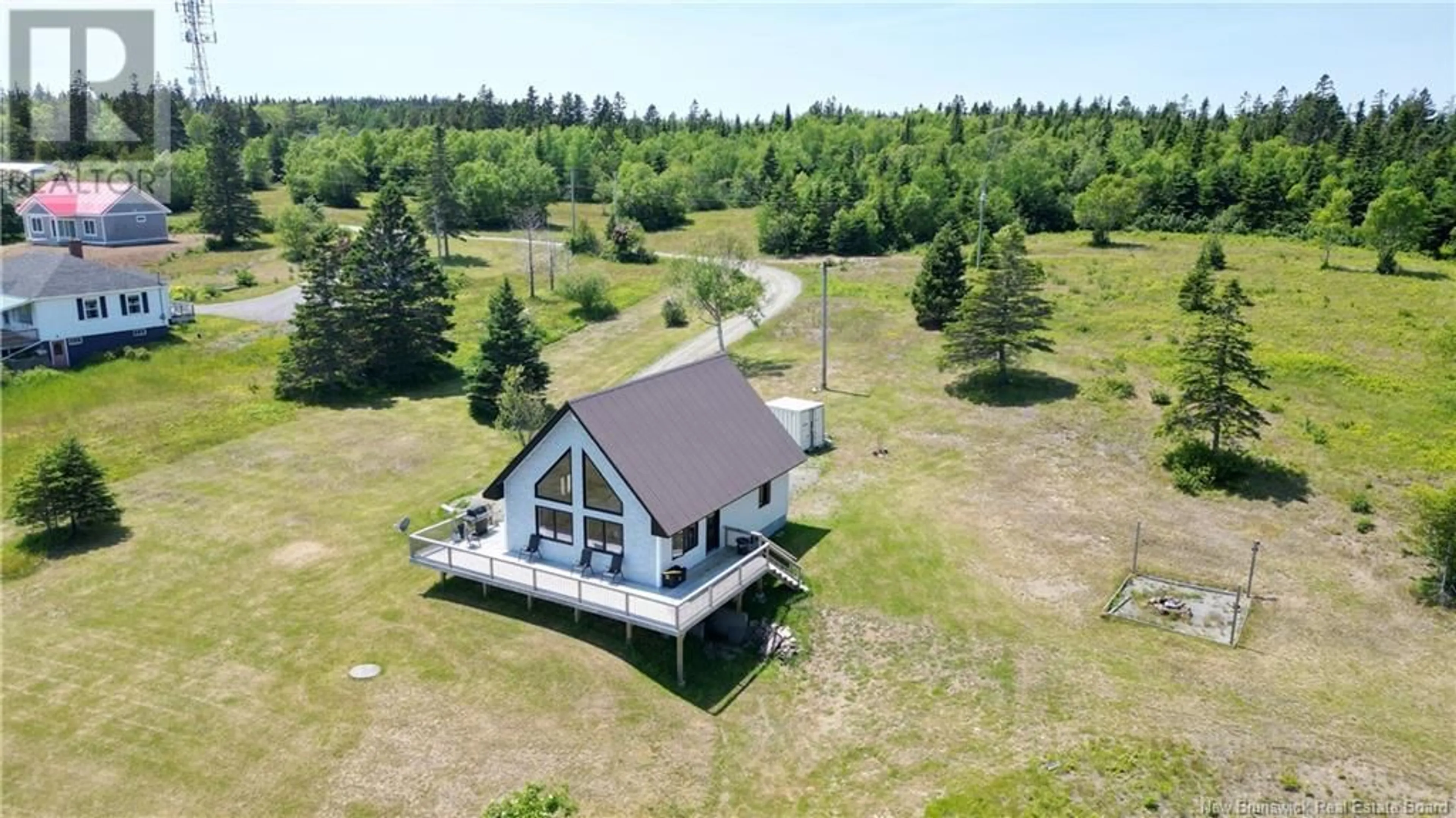 A pic from outside/outdoor area/front of a property/back of a property/a pic from drone, water/lake/river/ocean view for 2 TEAKETTLE LANE, Grand Manan New Brunswick E5G2J8
