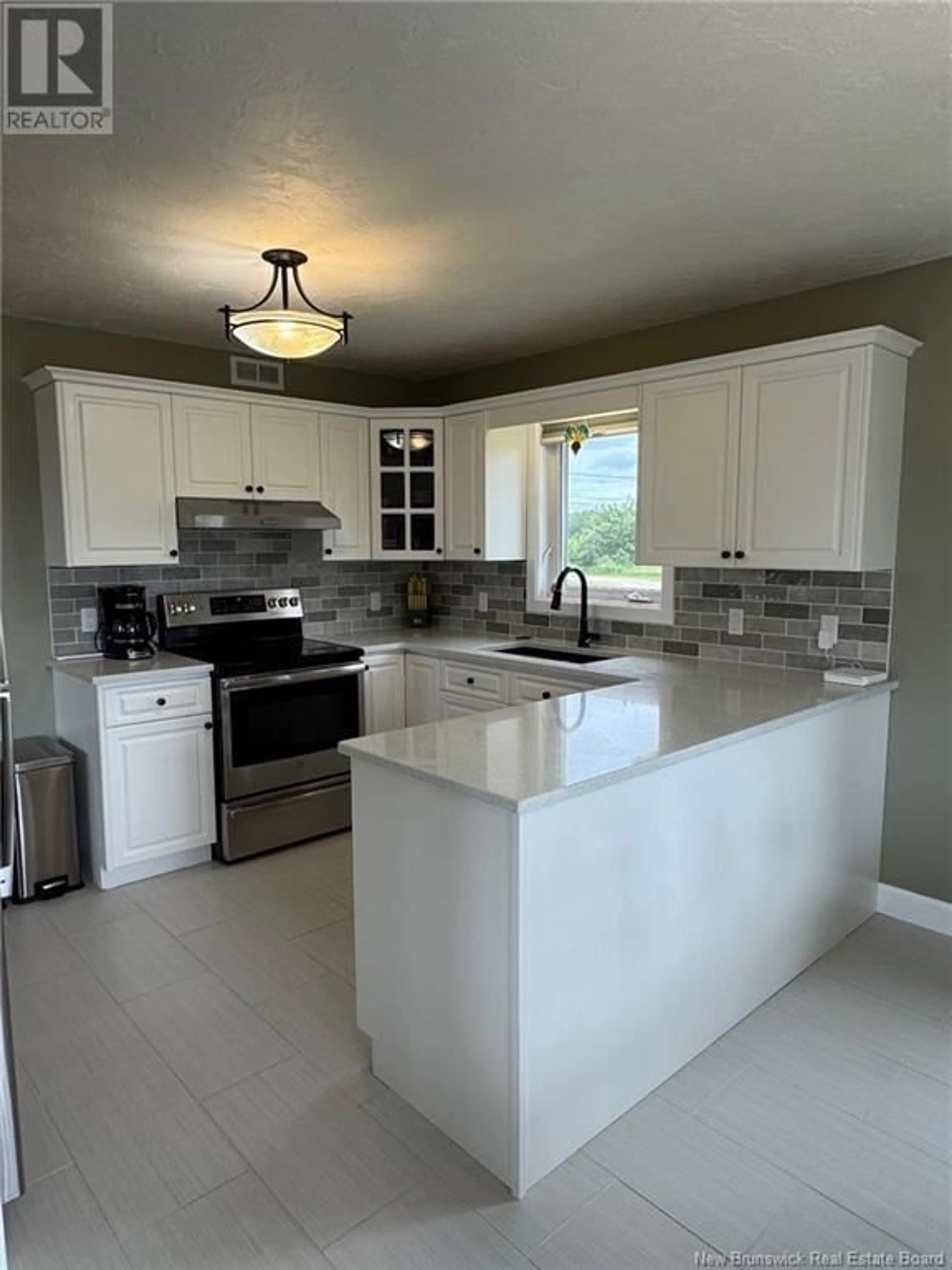 Open concept kitchen, ceramic/tile floor for 5317 ROUTE 535, Dixon Point New Brunswick E4S3Z7