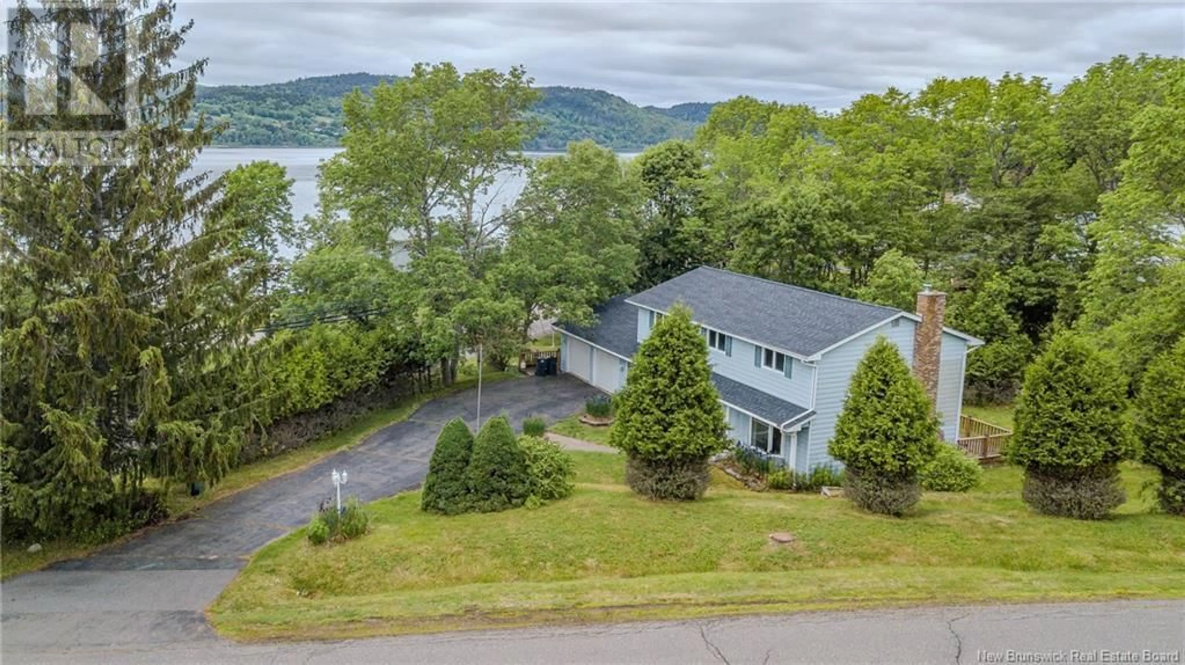 A pic from outside/outdoor area/front of a property/back of a property/a pic from drone, water/lake/river/ocean view for 1001 ARCHER DRIVE, Quispamsis New Brunswick E2E1E6
