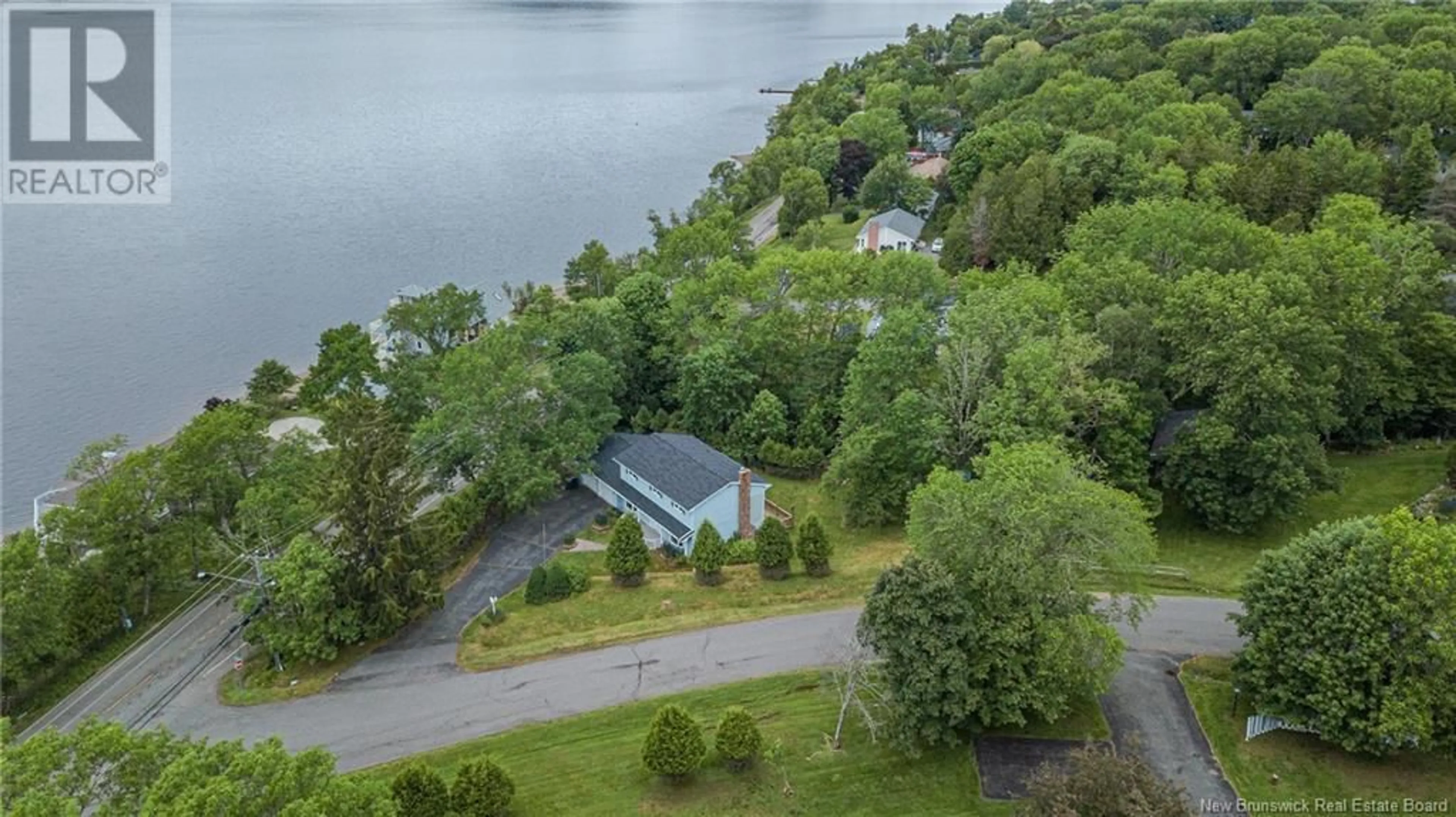 A pic from outside/outdoor area/front of a property/back of a property/a pic from drone, water/lake/river/ocean view for 1001 ARCHER DRIVE, Quispamsis New Brunswick E2E1E6