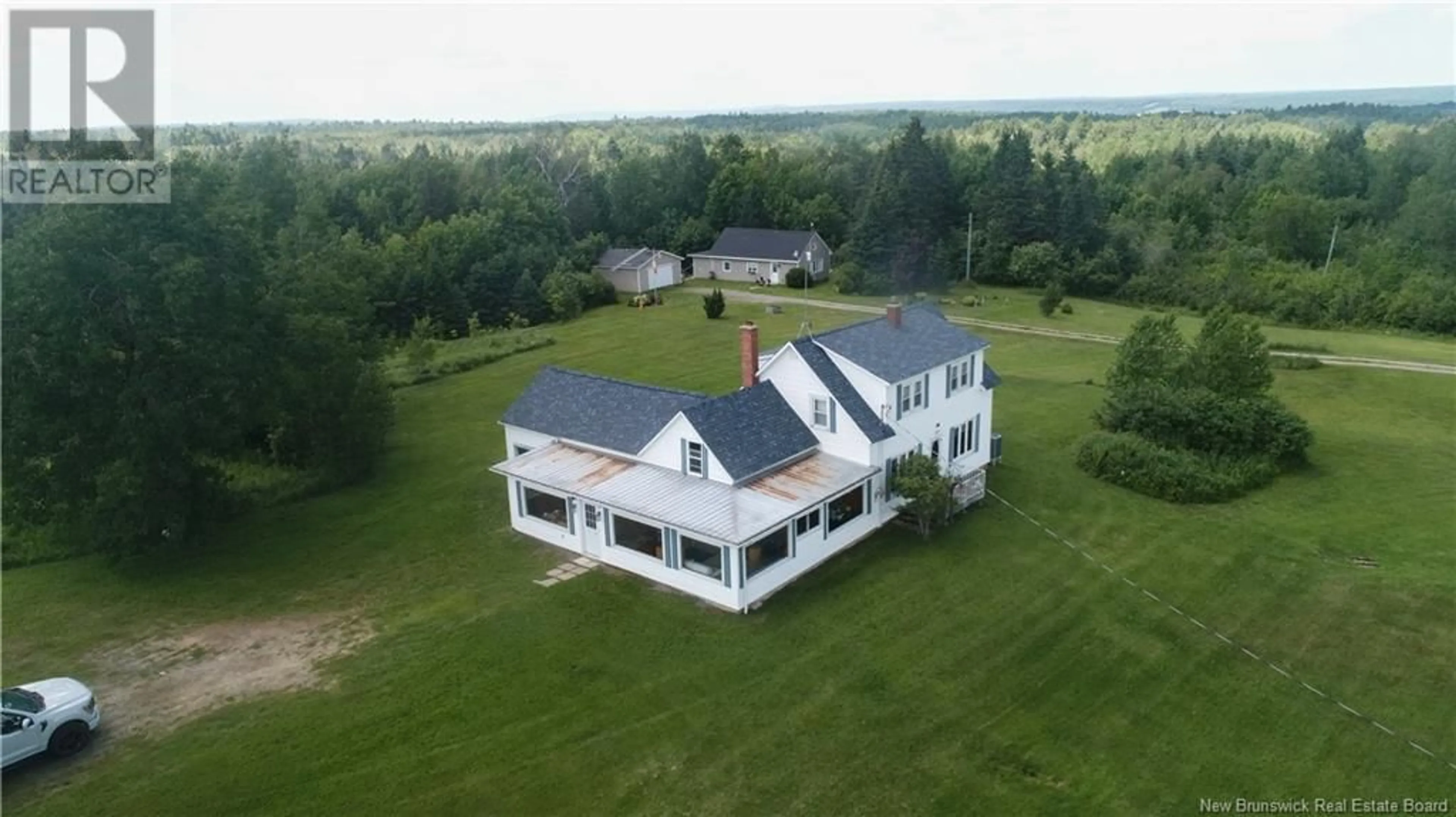 A pic from outside/outdoor area/front of a property/back of a property/a pic from drone, building for 182 ROUTE 3, New Market New Brunswick E6K2W2