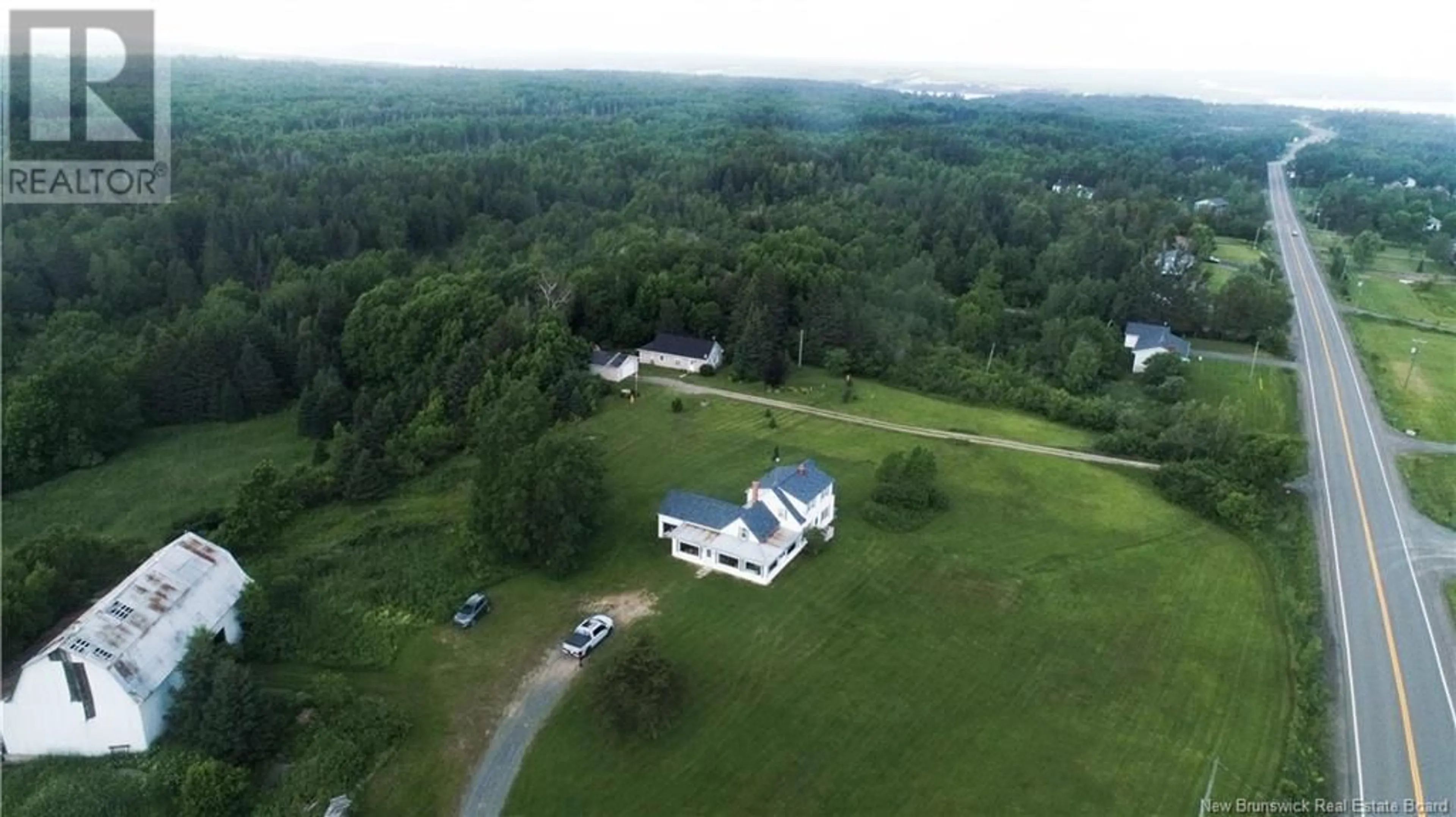 A pic from outside/outdoor area/front of a property/back of a property/a pic from drone, mountain view for 182 ROUTE 3, New Market New Brunswick E6K2W2
