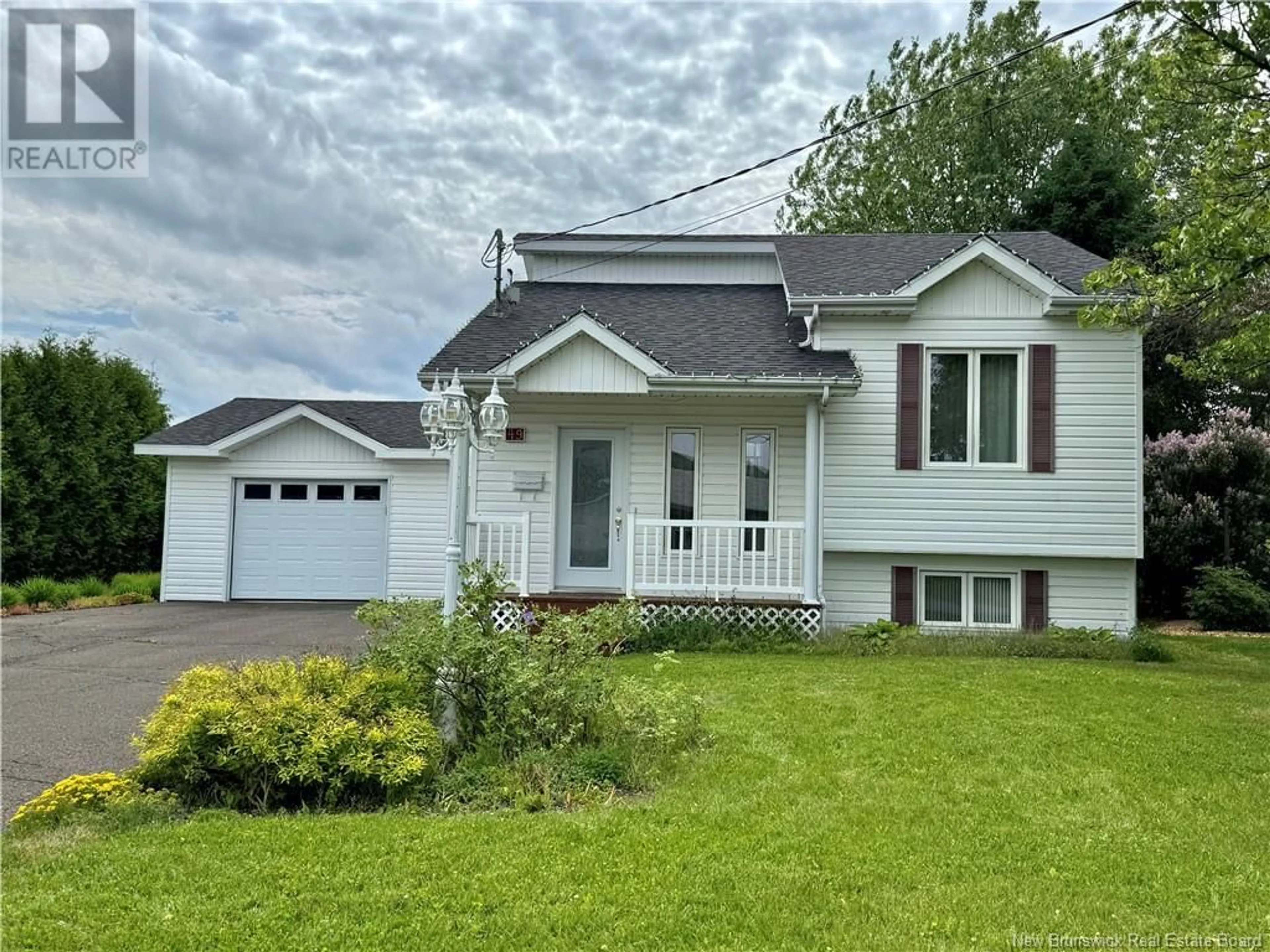 Home with vinyl exterior material, street for 49 RUE LEBEL STREET, Edmundston New Brunswick E3V3Y3