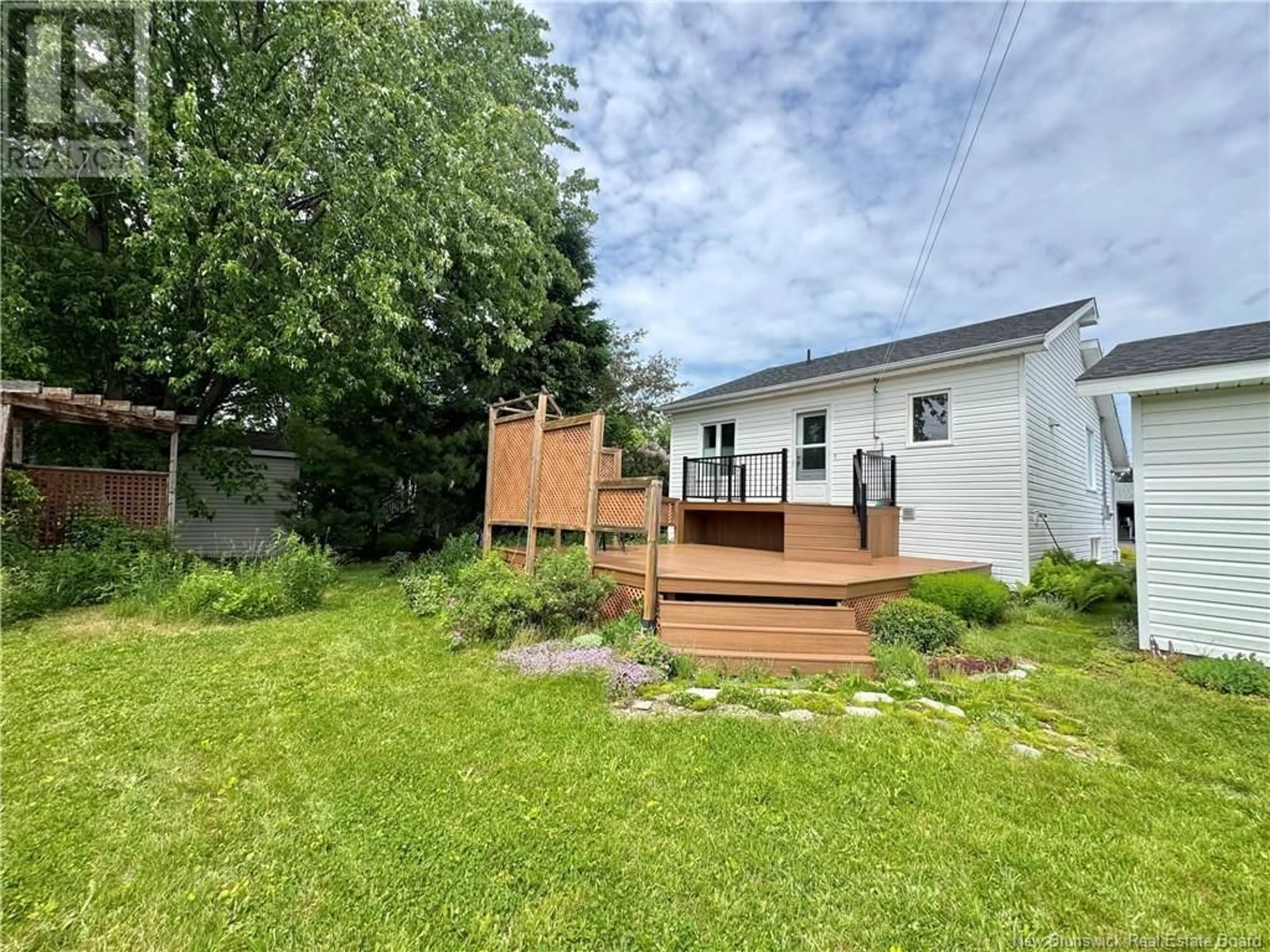 A pic from outside/outdoor area/front of a property/back of a property/a pic from drone, street for 49 RUE LEBEL STREET, Edmundston New Brunswick E3V3Y3