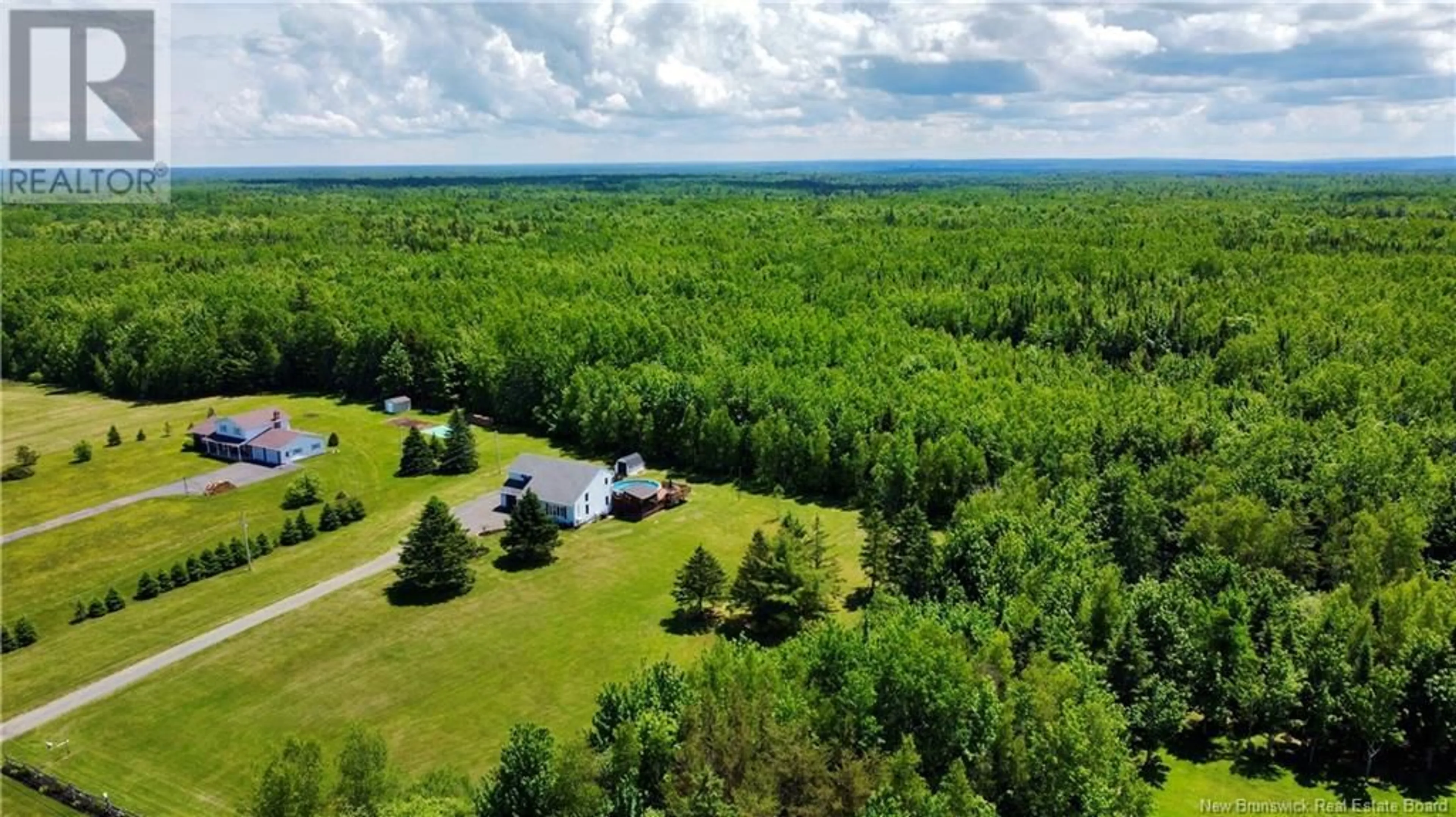 A pic from outside/outdoor area/front of a property/back of a property/a pic from drone, forest/trees view for 110 VALLEY RANCH ROAD, Irishtown New Brunswick E1H2R3