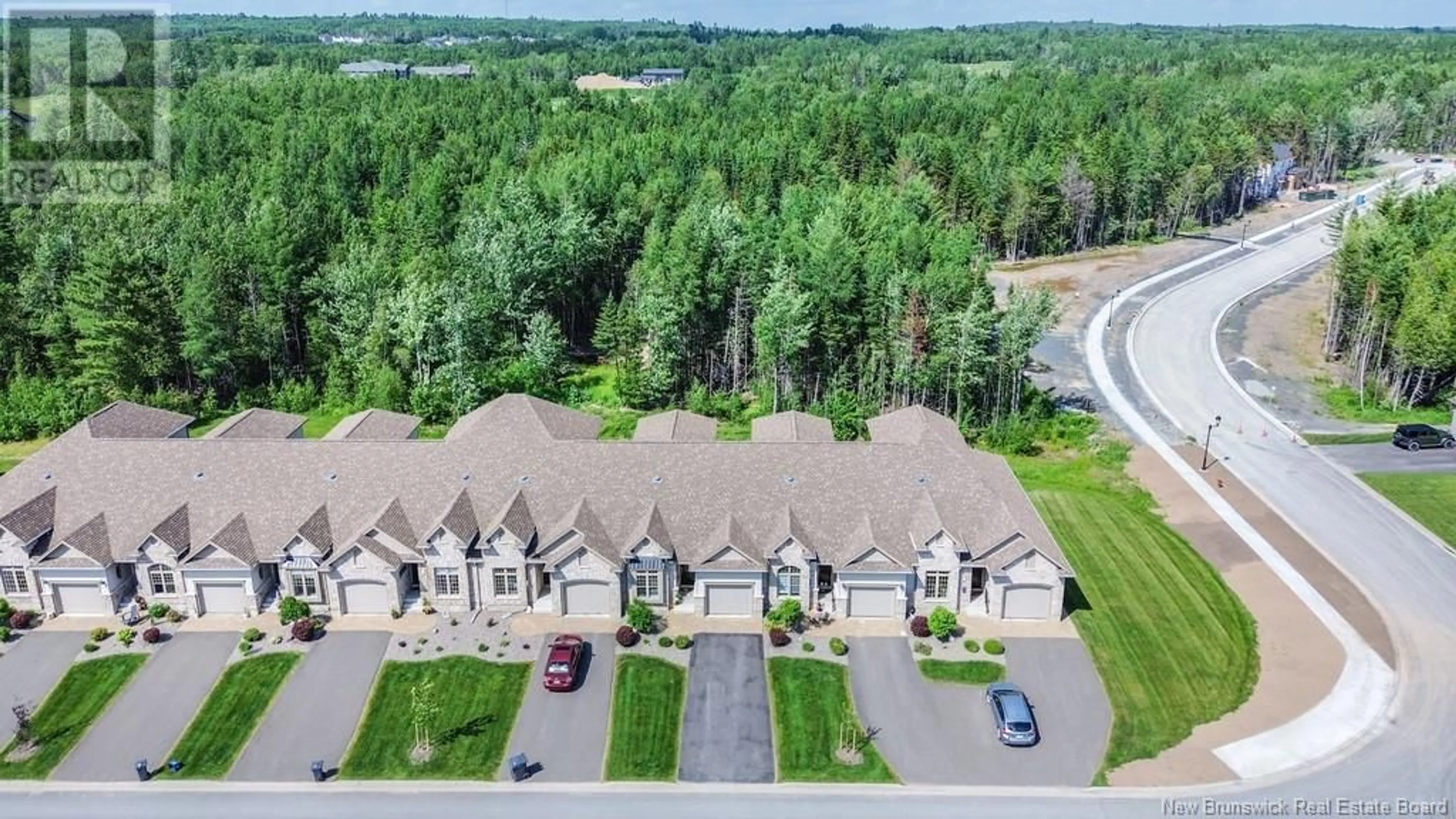 A pic from outside/outdoor area/front of a property/back of a property/a pic from drone, water/lake/river/ocean view for 29 CAMDEN LANE, Fredericton New Brunswick E3G0E5