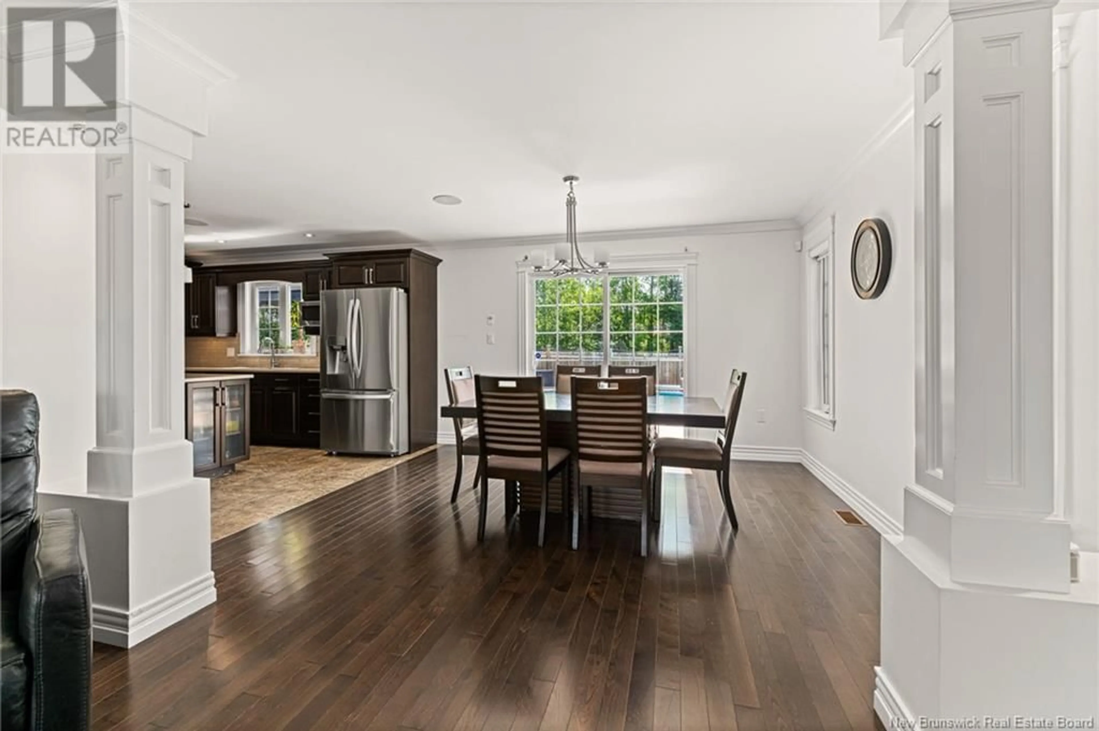 Open concept kitchen, wood/laminate floor for 69 SHIAJAN CRESCENT, Moncton New Brunswick E1G0L5