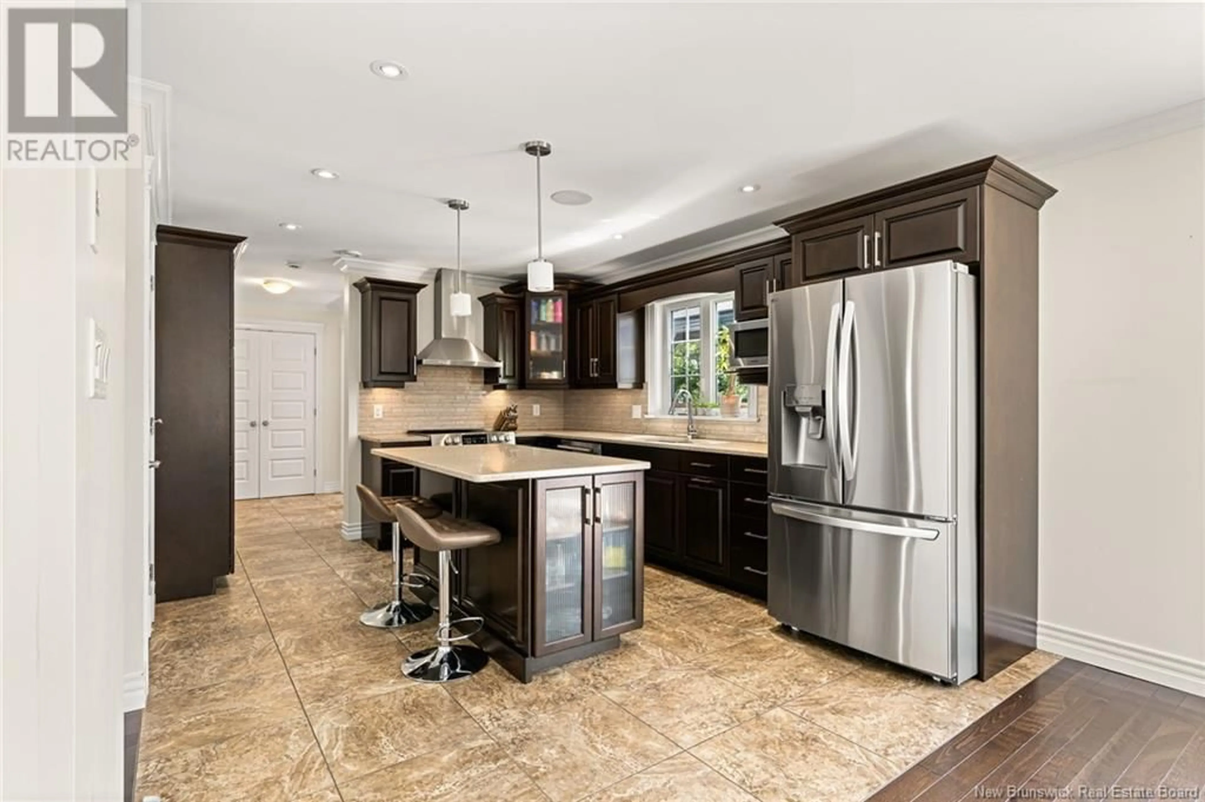Open concept kitchen, ceramic/tile floor for 69 SHIAJAN CRESCENT, Moncton New Brunswick E1G0L5
