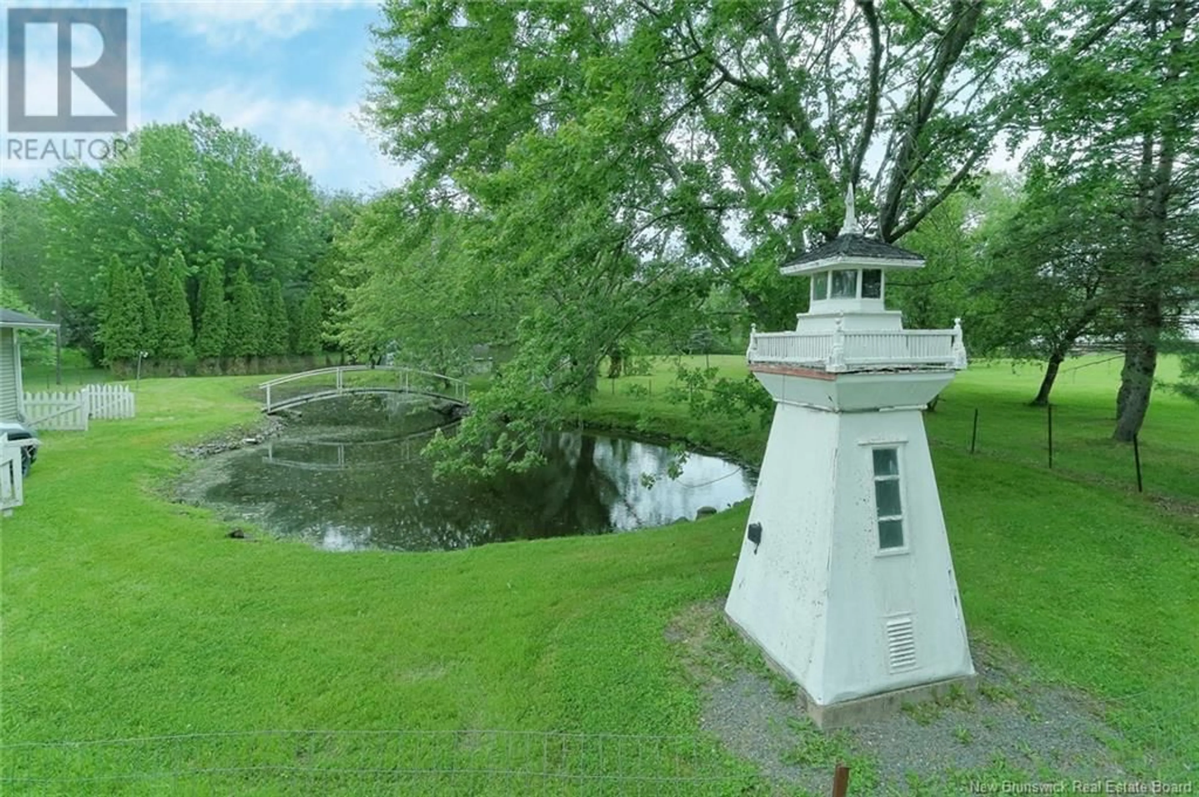 A pic from outside/outdoor area/front of a property/back of a property/a pic from drone, water/lake/river/ocean view for 30 ROSEWOOD DRIVE, Lincoln New Brunswick E3B7G8