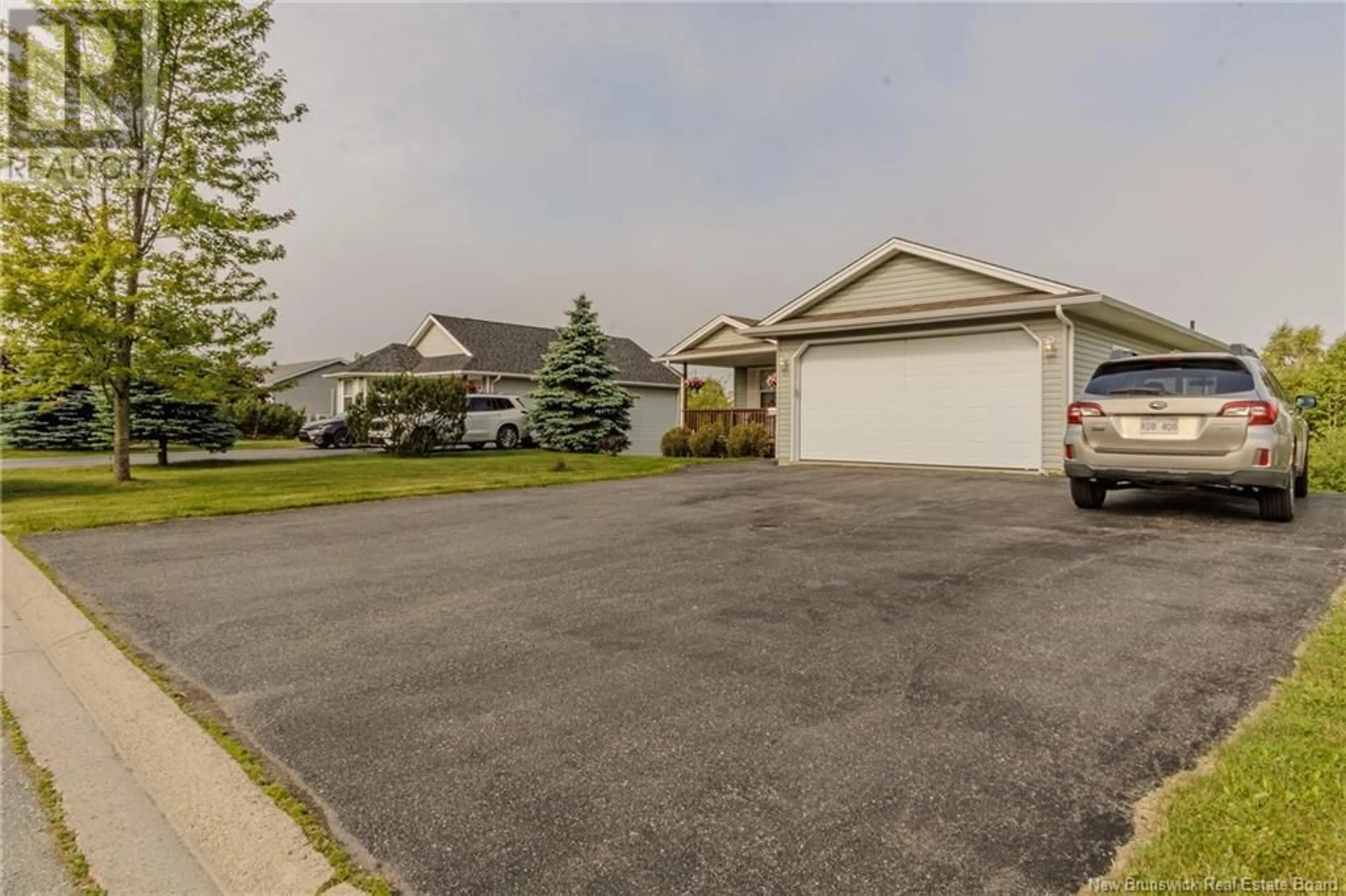 A pic from outside/outdoor area/front of a property/back of a property/a pic from drone, street for 100 CARLILE CRESCENT, Saint John New Brunswick E2J5C4