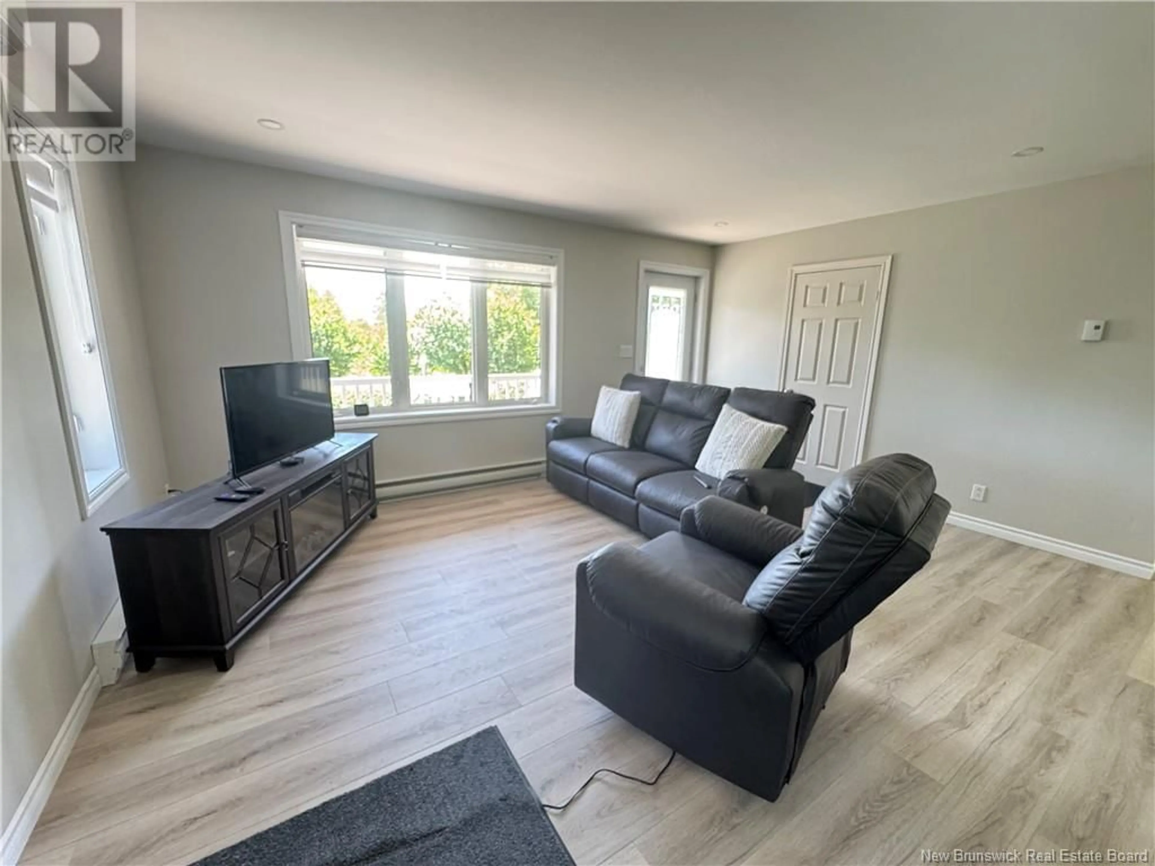 Living room with furniture, unknown for 74 PETIT OUEST ROAD, Kedgwick New Brunswick E8B1T7