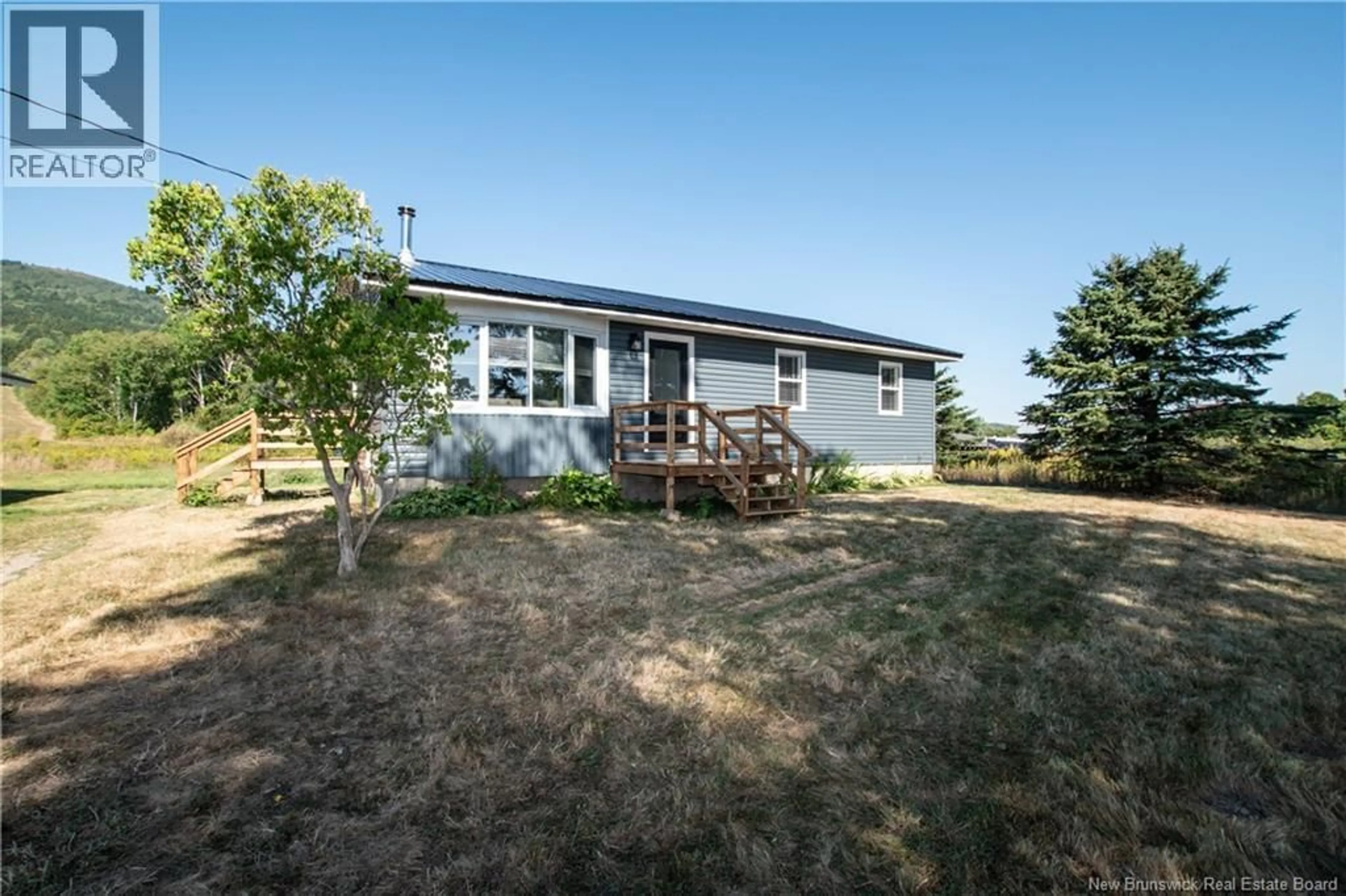 A pic from outside/outdoor area/front of a property/back of a property/a pic from drone, unknown for 4626 ROUTE 114, Shepody New Brunswick E4H4J7