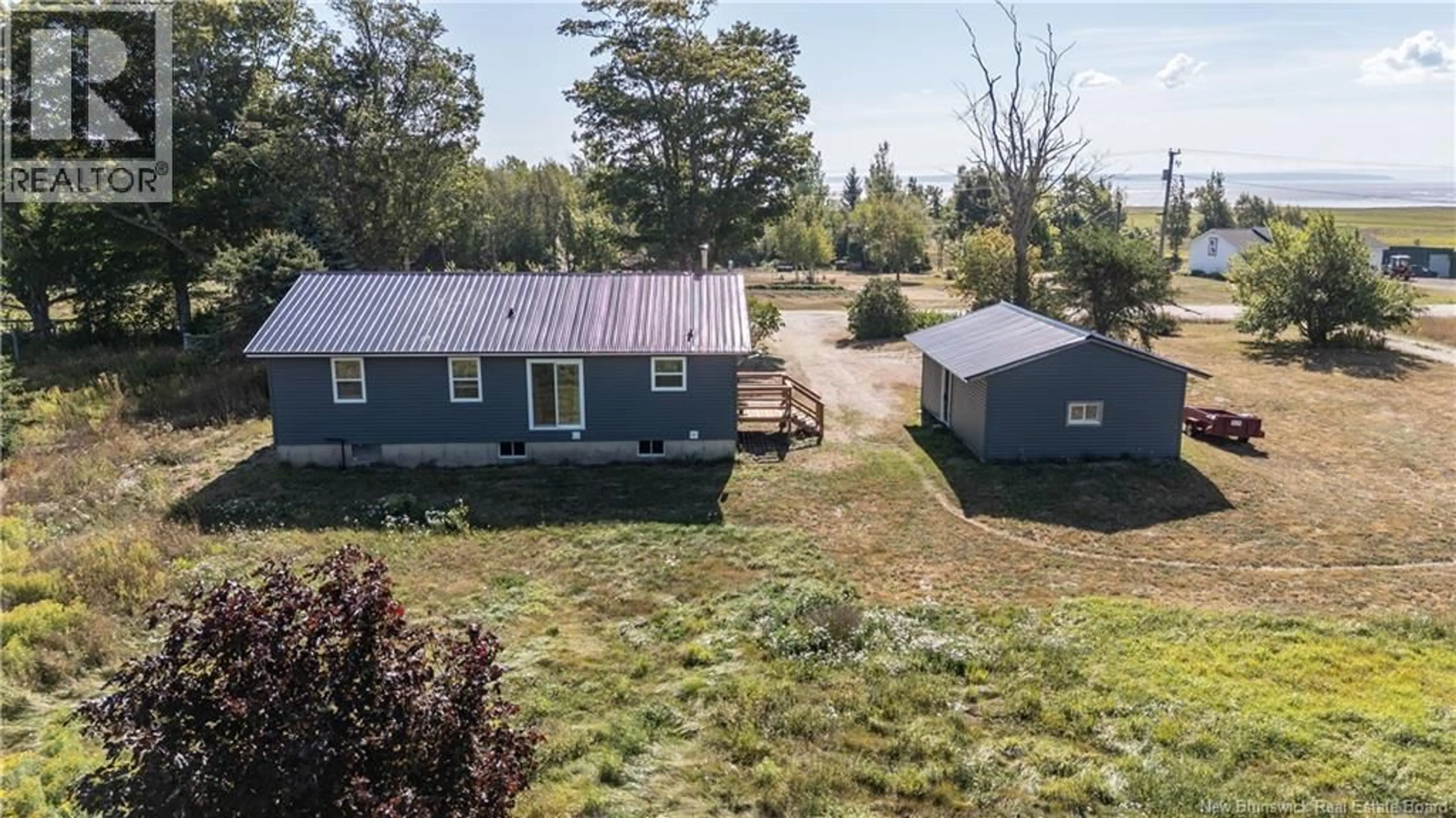 A pic from outside/outdoor area/front of a property/back of a property/a pic from drone, unknown for 4626 ROUTE 114, Shepody New Brunswick E4H4J7
