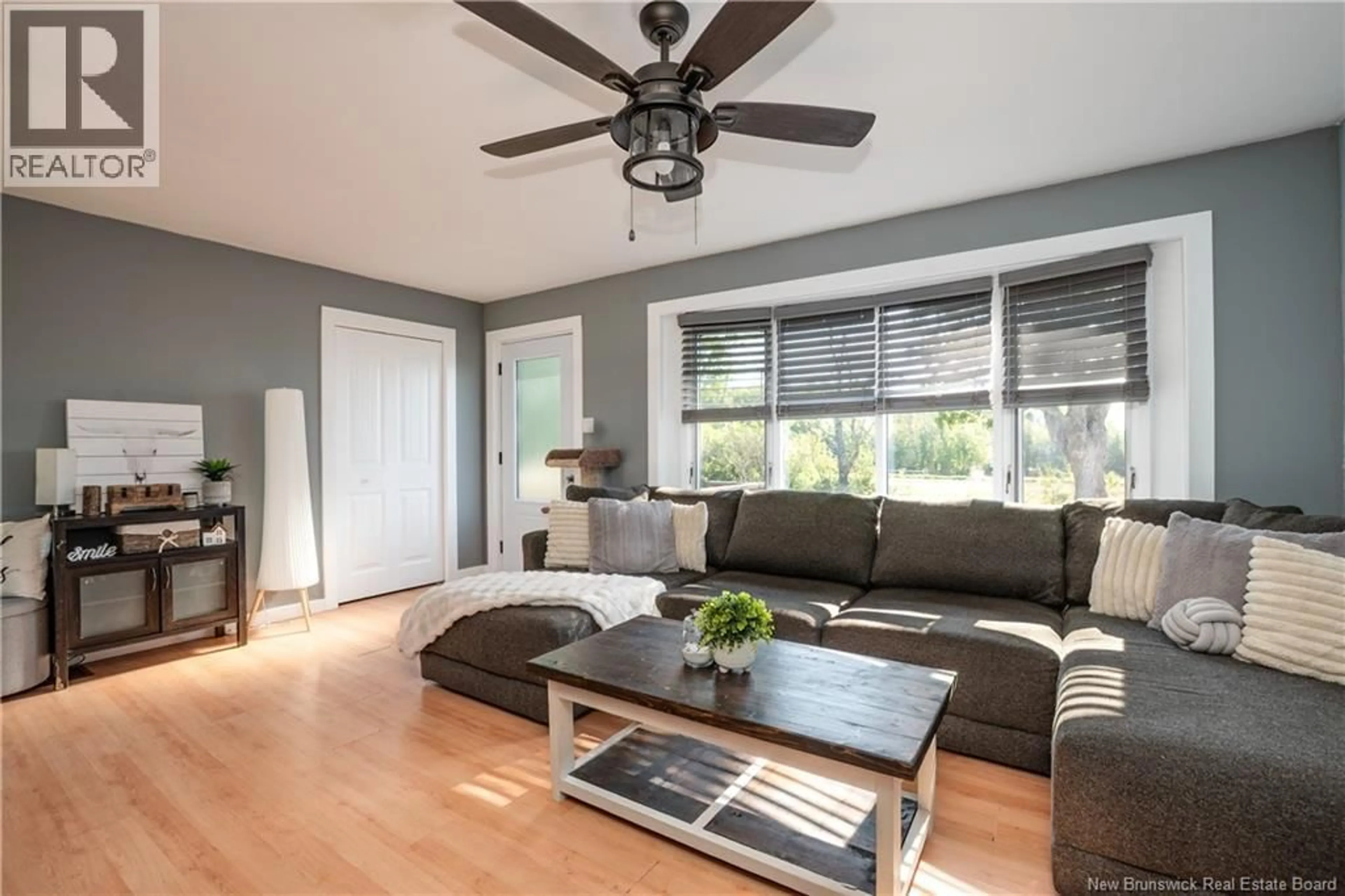 Living room with furniture, wood/laminate floor for 4626 ROUTE 114, Shepody New Brunswick E4H4J7