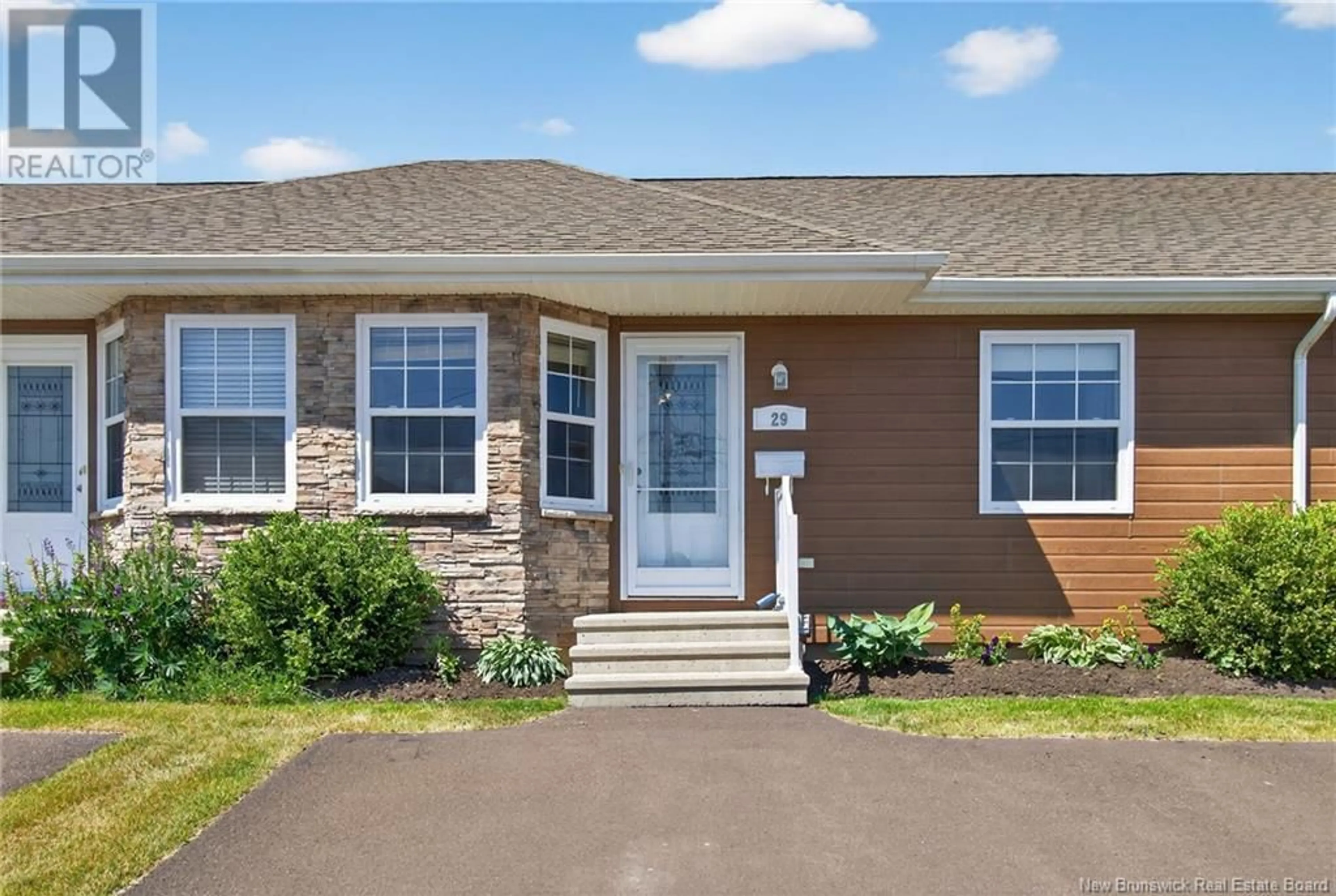 Home with vinyl exterior material, street for 29 AIME STREET, Dieppe New Brunswick E1A9K8