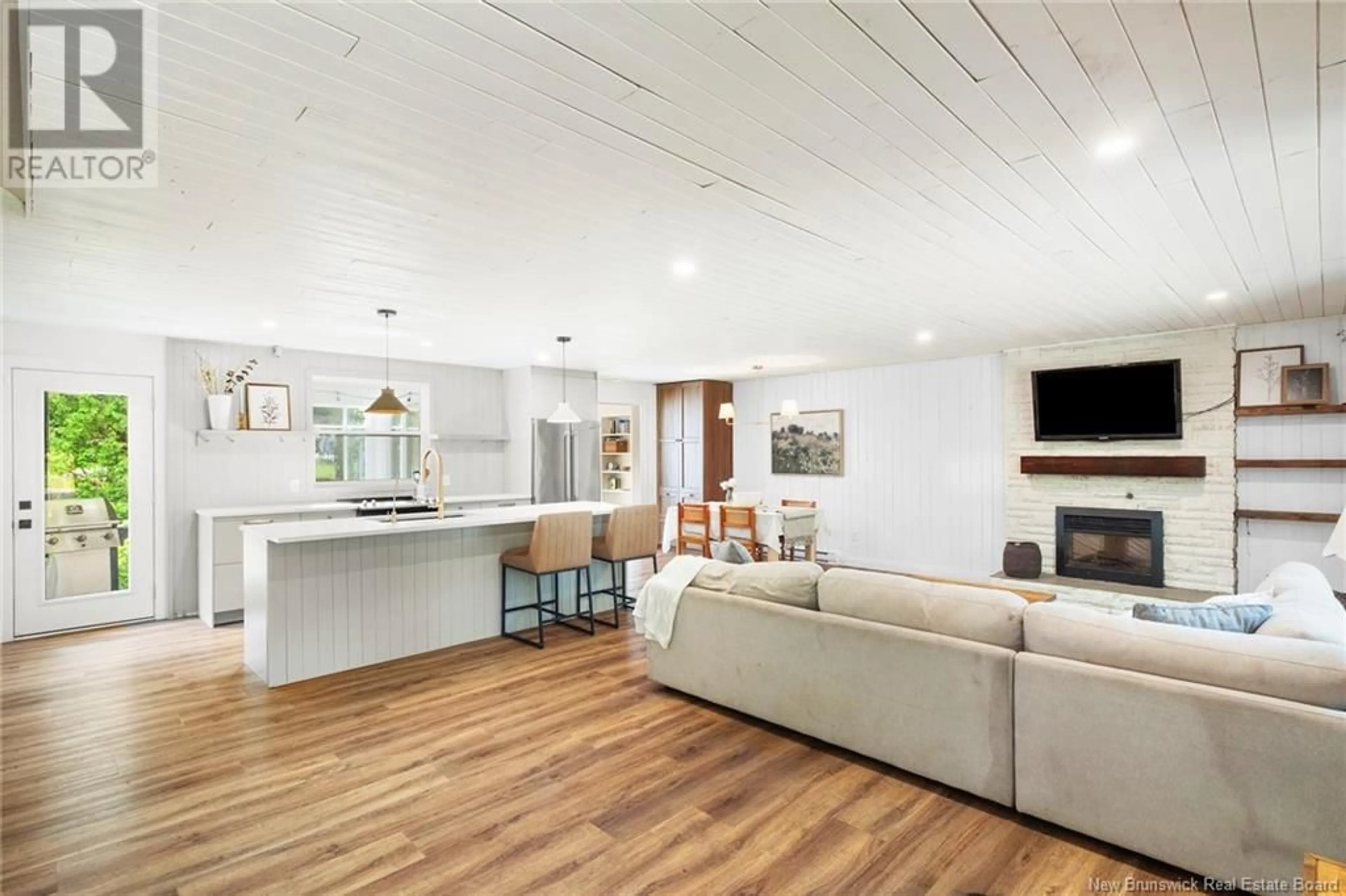 Open concept kitchen, wood/laminate floor for 98 NICHOLSON CRESCENT, New Maryland New Brunswick E3C1H4