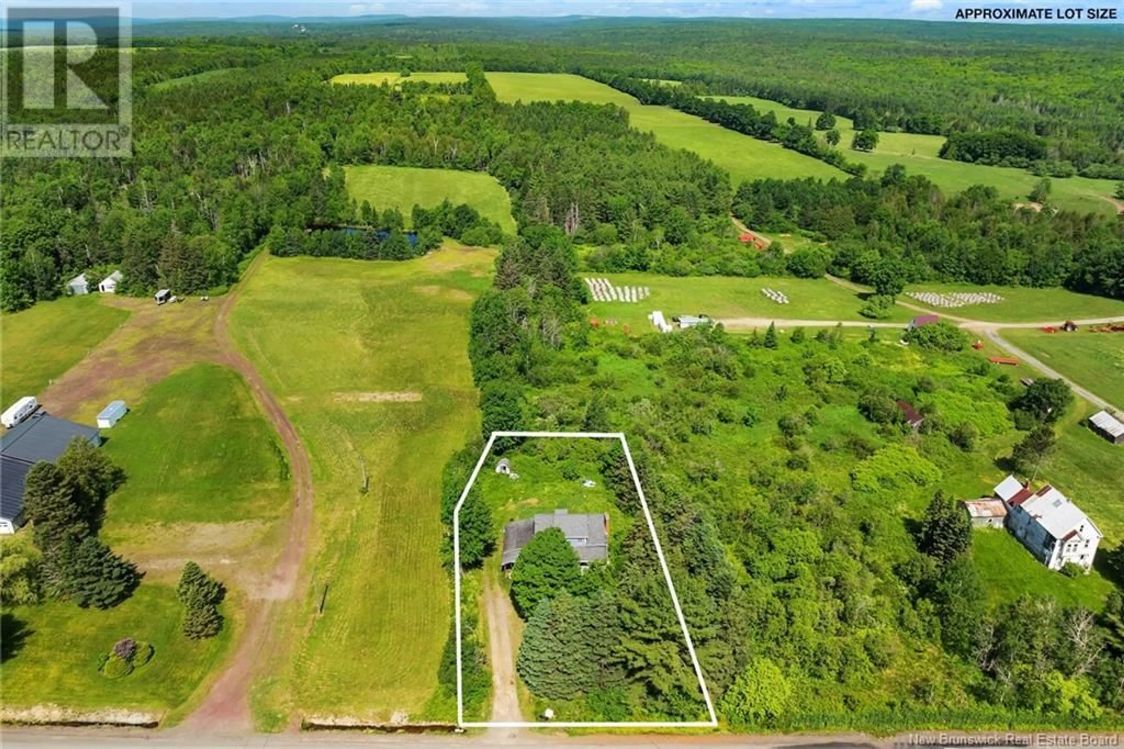 A pic from outside/outdoor area/front of a property/back of a property/a pic from drone, forest/trees view for 79 ROUTE 625, Cross Creek New Brunswick E6B2E1