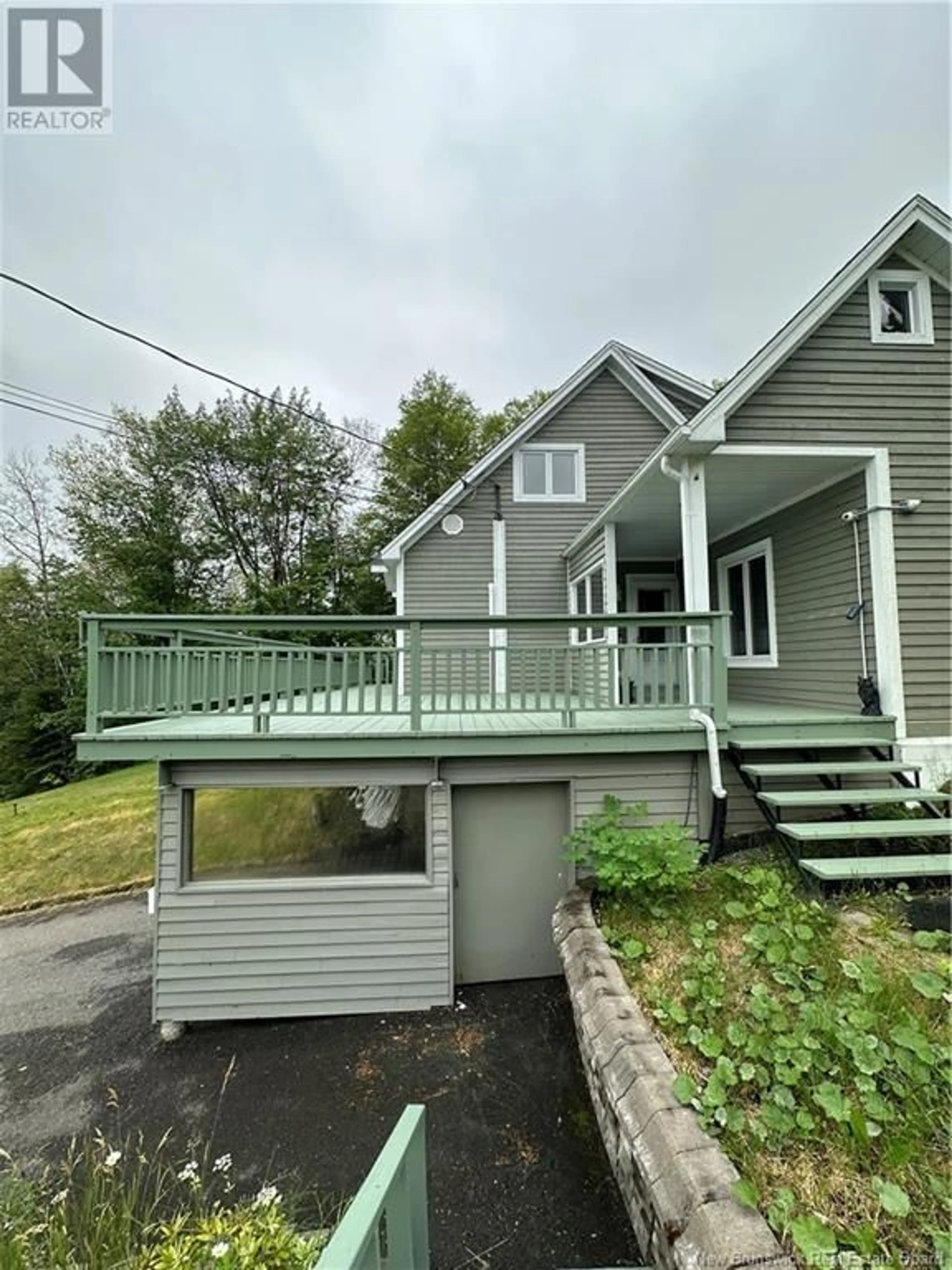 Home with vinyl exterior material, street for 50 DUBE, Edmundston New Brunswick E3V3K8
