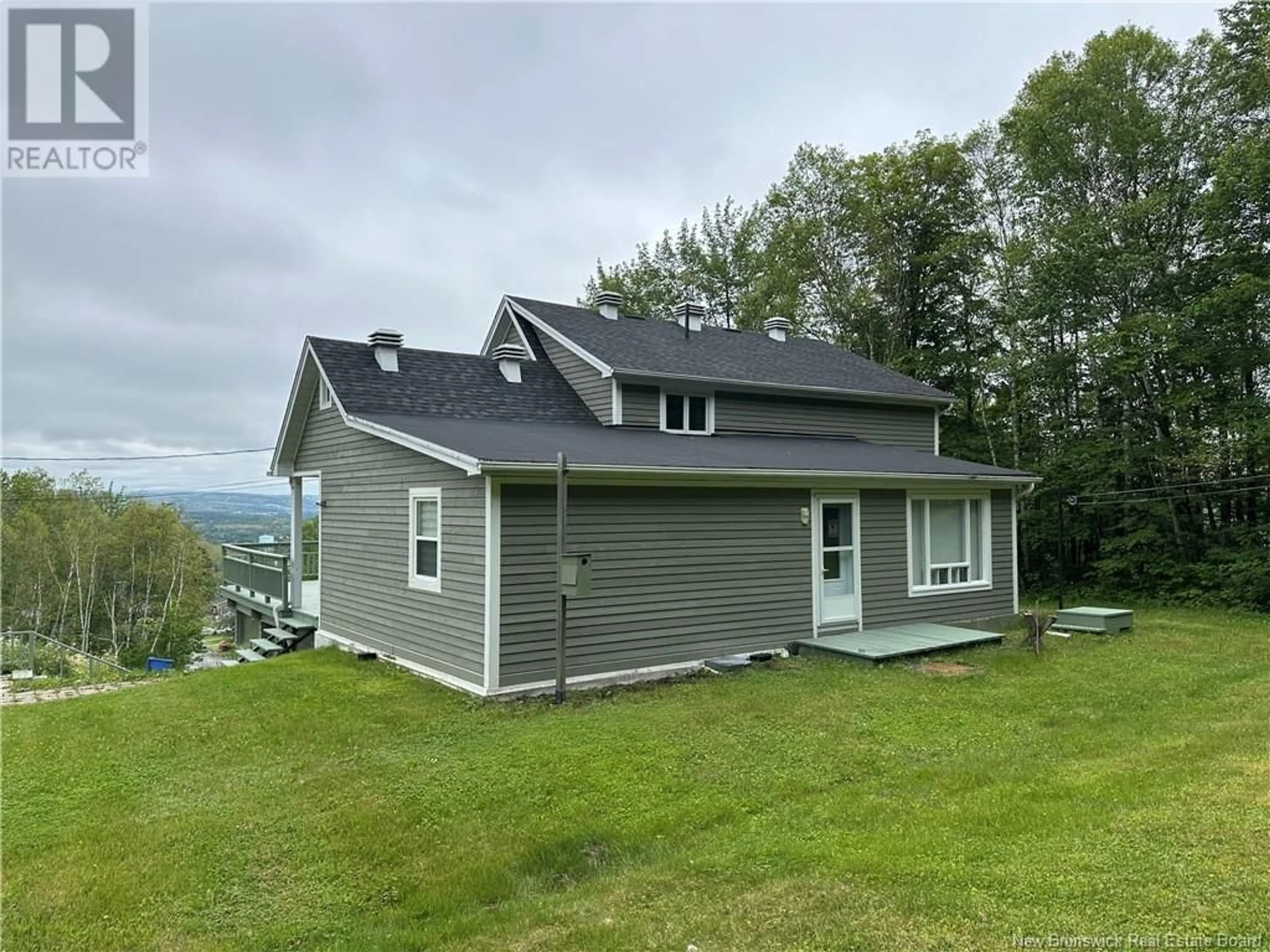 A pic from outside/outdoor area/front of a property/back of a property/a pic from drone, mountain view for 50 DUBE, Edmundston New Brunswick E3V3K8