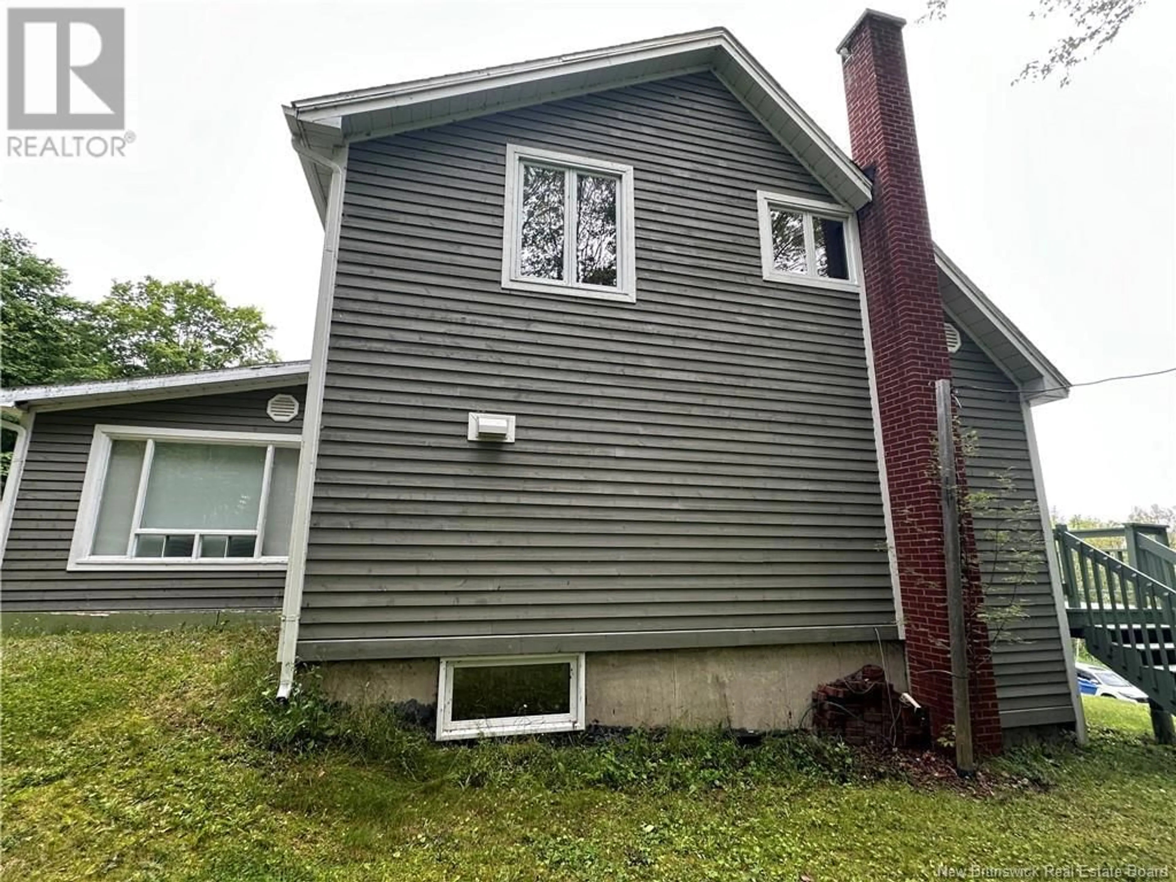 Home with vinyl exterior material, street for 50 DUBE, Edmundston New Brunswick E3V3K8