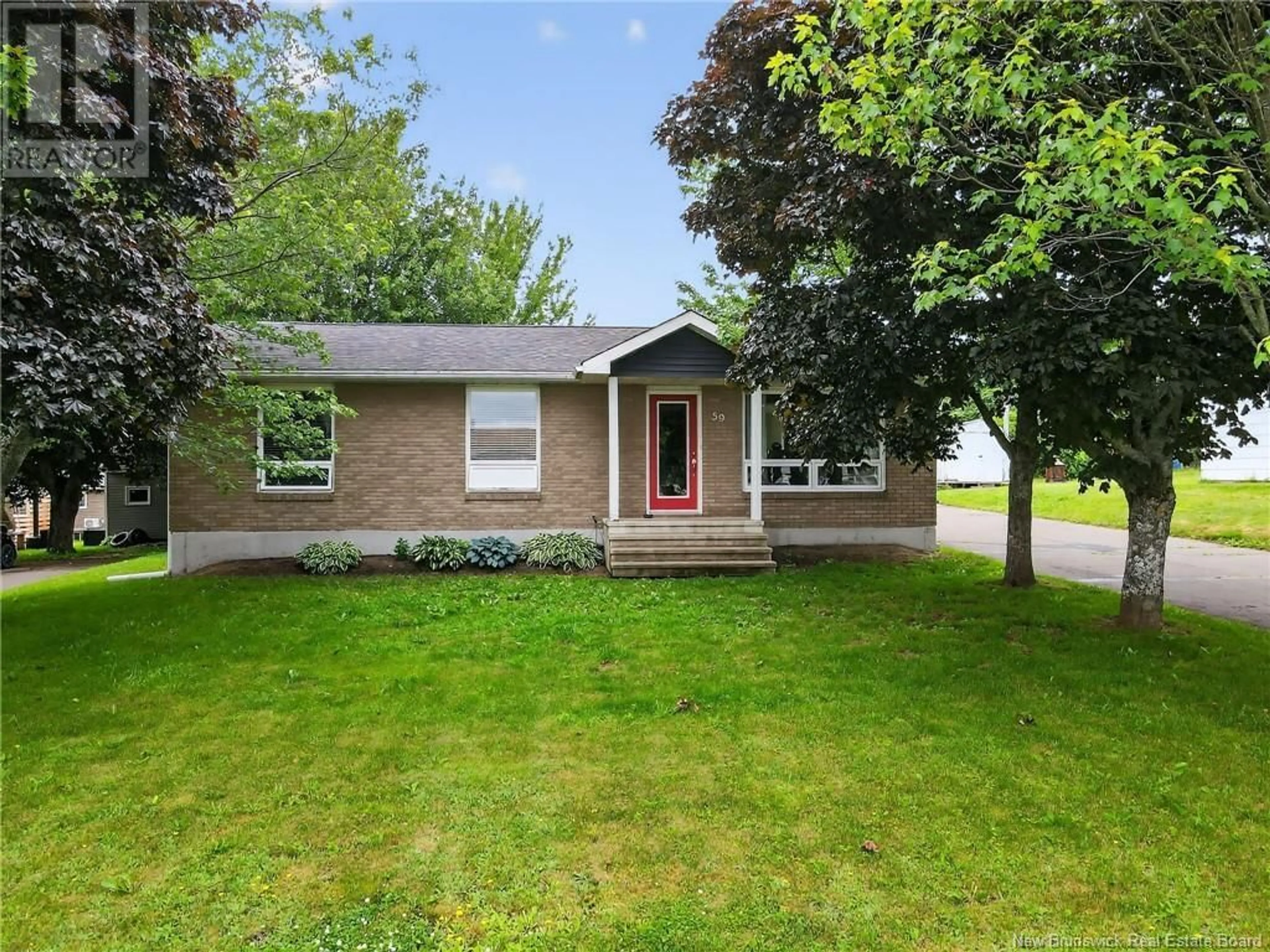 Home with vinyl exterior material, street for 59 CARTIER STREET, Shediac New Brunswick E4P1L1