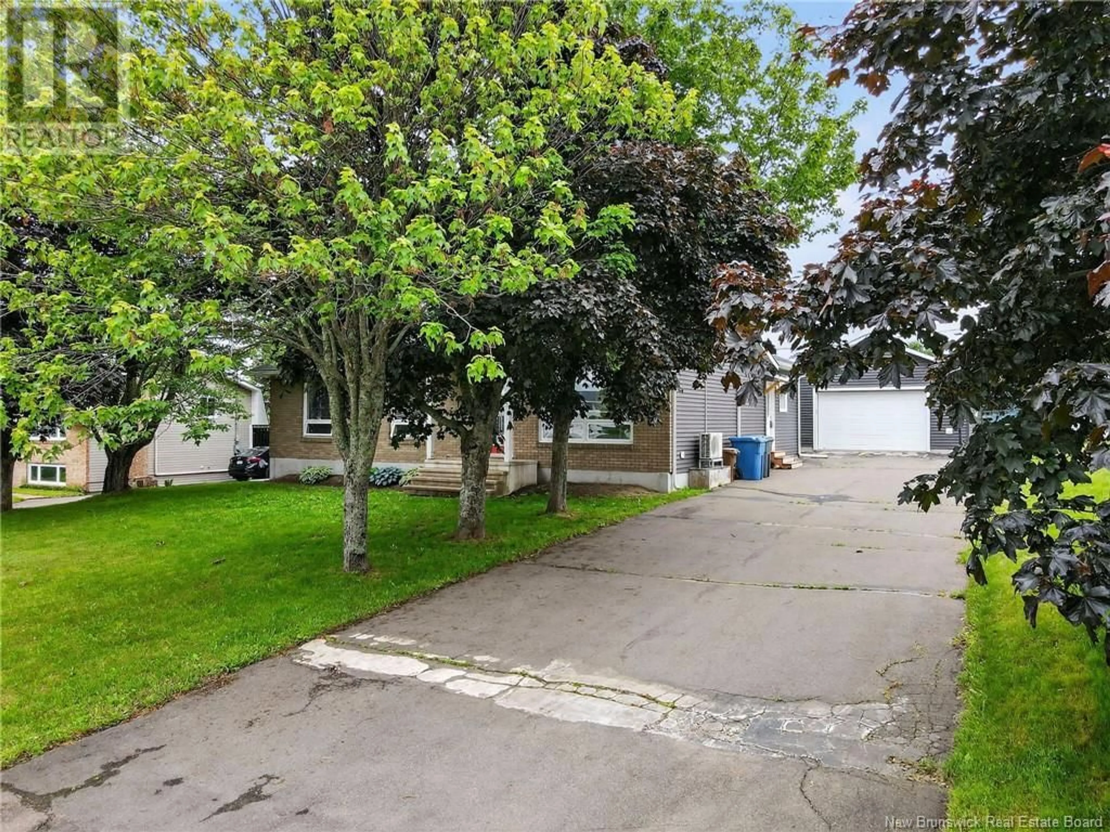 A pic from outside/outdoor area/front of a property/back of a property/a pic from drone, street for 59 CARTIER STREET, Shediac New Brunswick E4P1L1