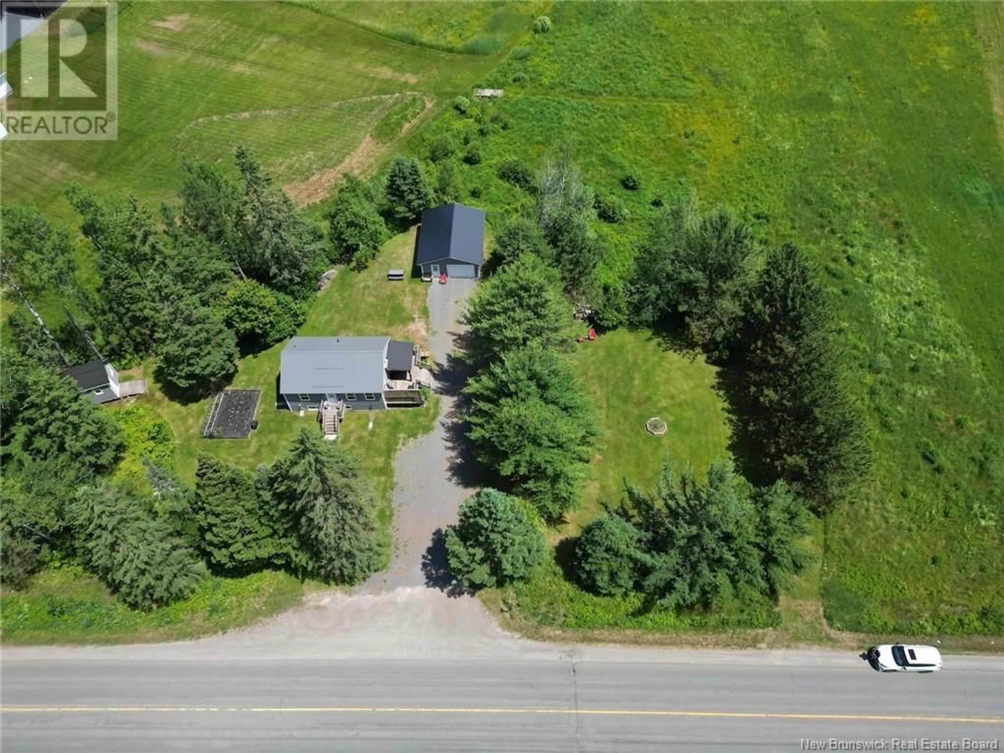 A pic from outside/outdoor area/front of a property/back of a property/a pic from drone, street for 2845 ROUTE 101, Beaver Dam New Brunswick E3B7Z9