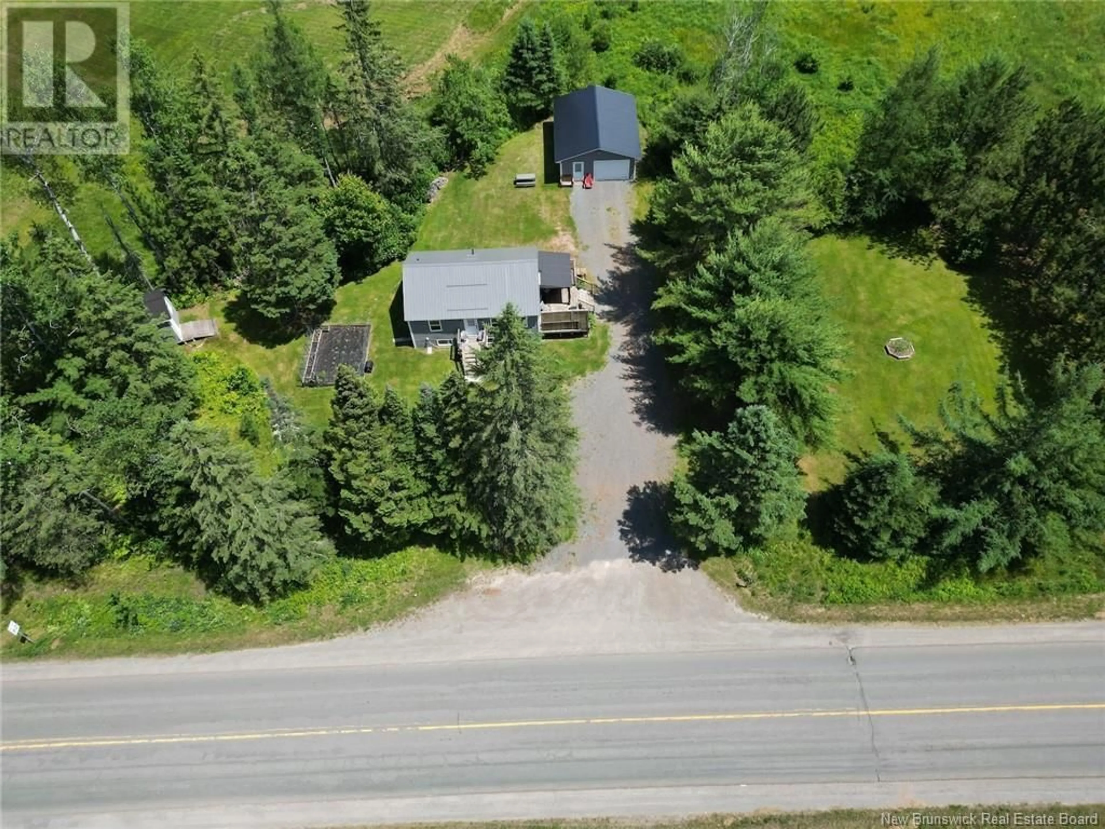 A pic from outside/outdoor area/front of a property/back of a property/a pic from drone, street for 2845 ROUTE 101, Beaver Dam New Brunswick E3B7Z9