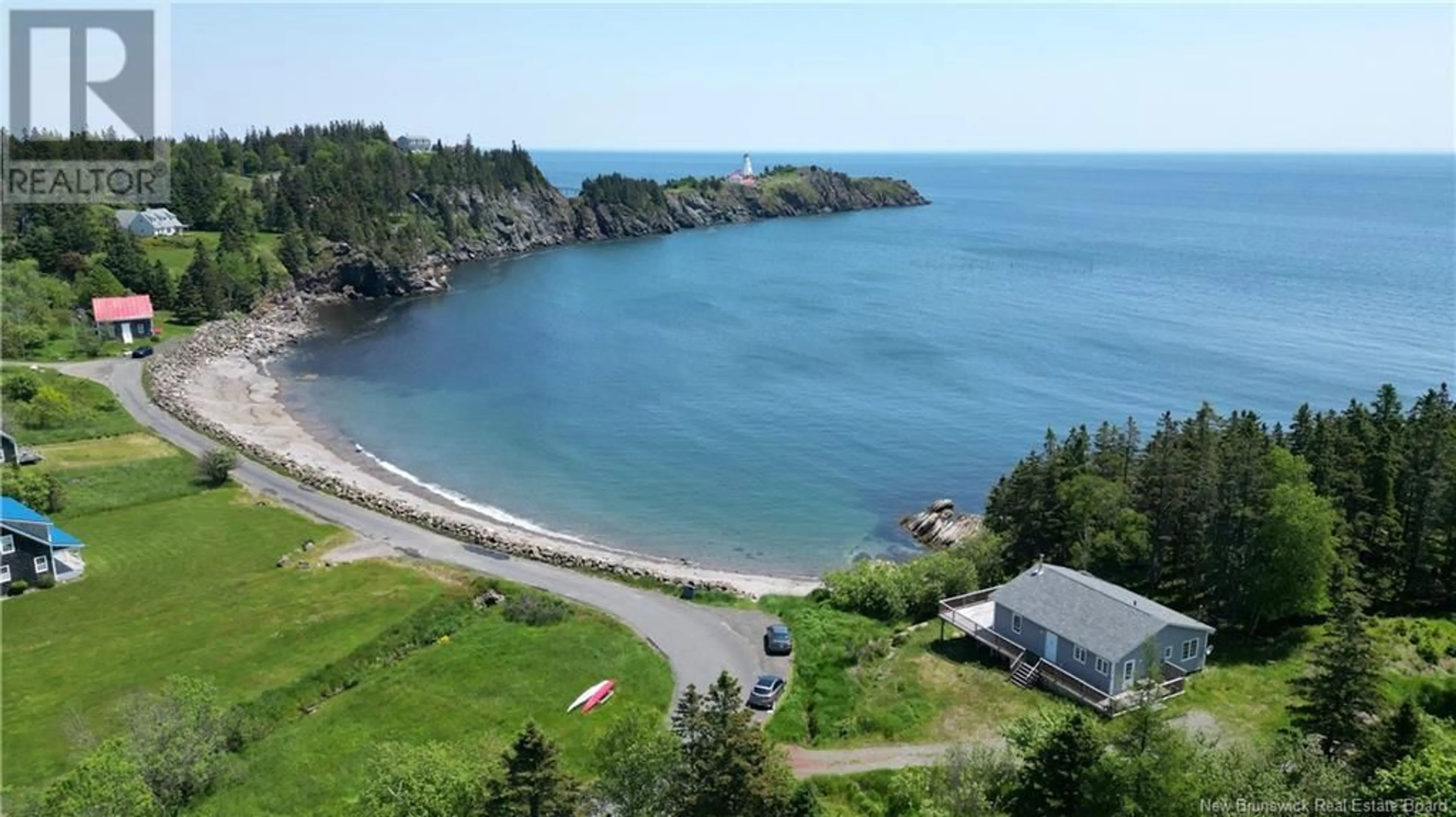 A pic from outside/outdoor area/front of a property/back of a property/a pic from drone, water/lake/river/ocean view for 22 PETTES COVE ROAD, Grand Manan New Brunswick E5G1A7