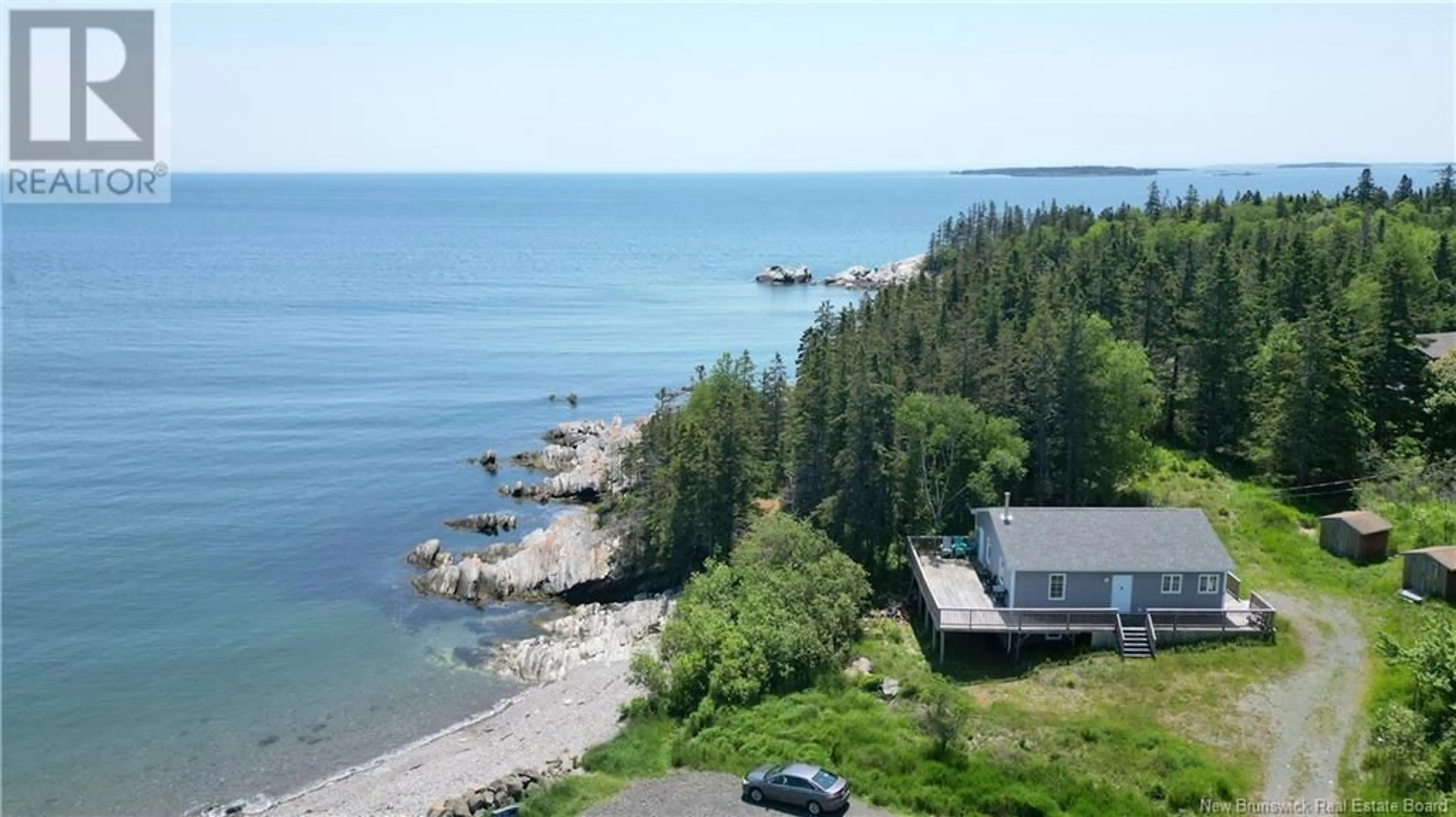 A pic from outside/outdoor area/front of a property/back of a property/a pic from drone, water/lake/river/ocean view for 22 PETTES COVE ROAD, Grand Manan New Brunswick E5G1A7