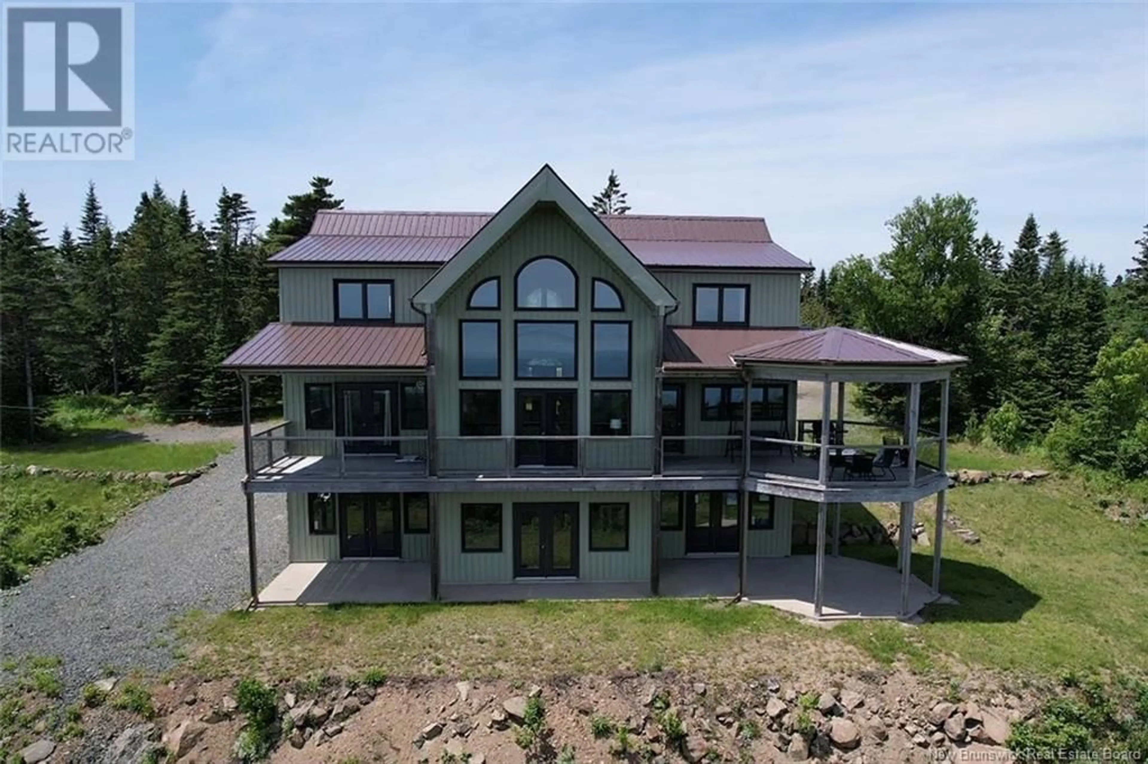 A pic from outside/outdoor area/front of a property/back of a property/a pic from drone, building for 60 OHIO POND ROAD, Grand Manan New Brunswick E5G4B4