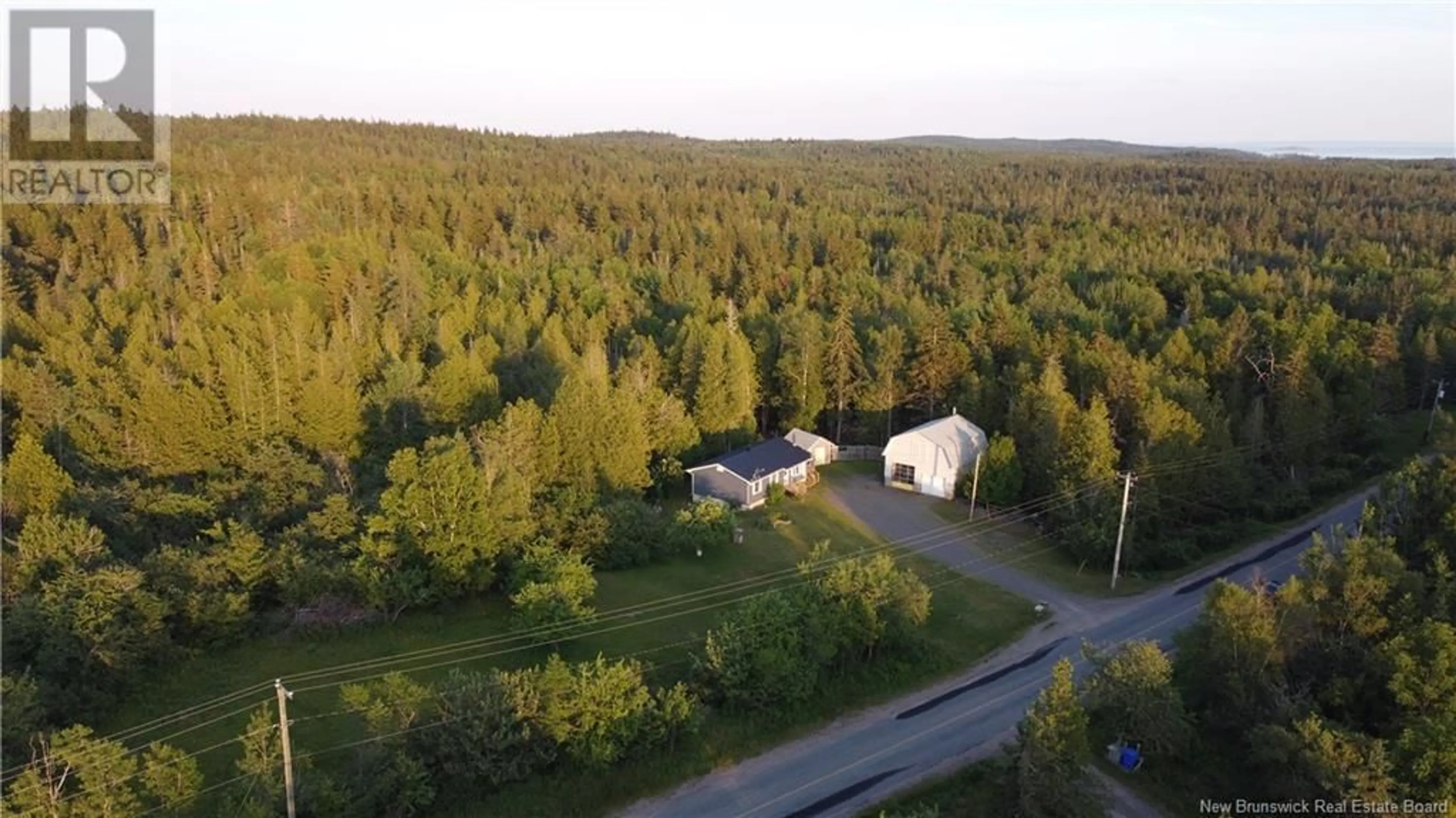 A pic from outside/outdoor area/front of a property/back of a property/a pic from drone, forest/trees view for 402 MASCARENE ROAD, Mascarene New Brunswick E5C2R9