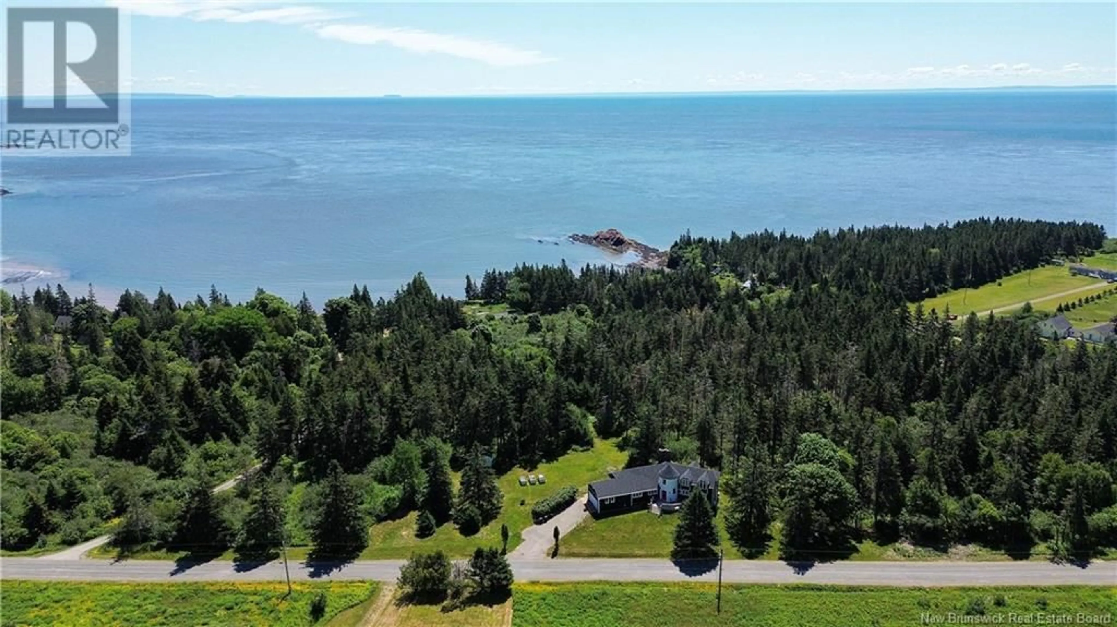 A pic from outside/outdoor area/front of a property/back of a property/a pic from drone, water/lake/river/ocean view for 319 QUACO ROAD, West Quaco New Brunswick E5R2E4