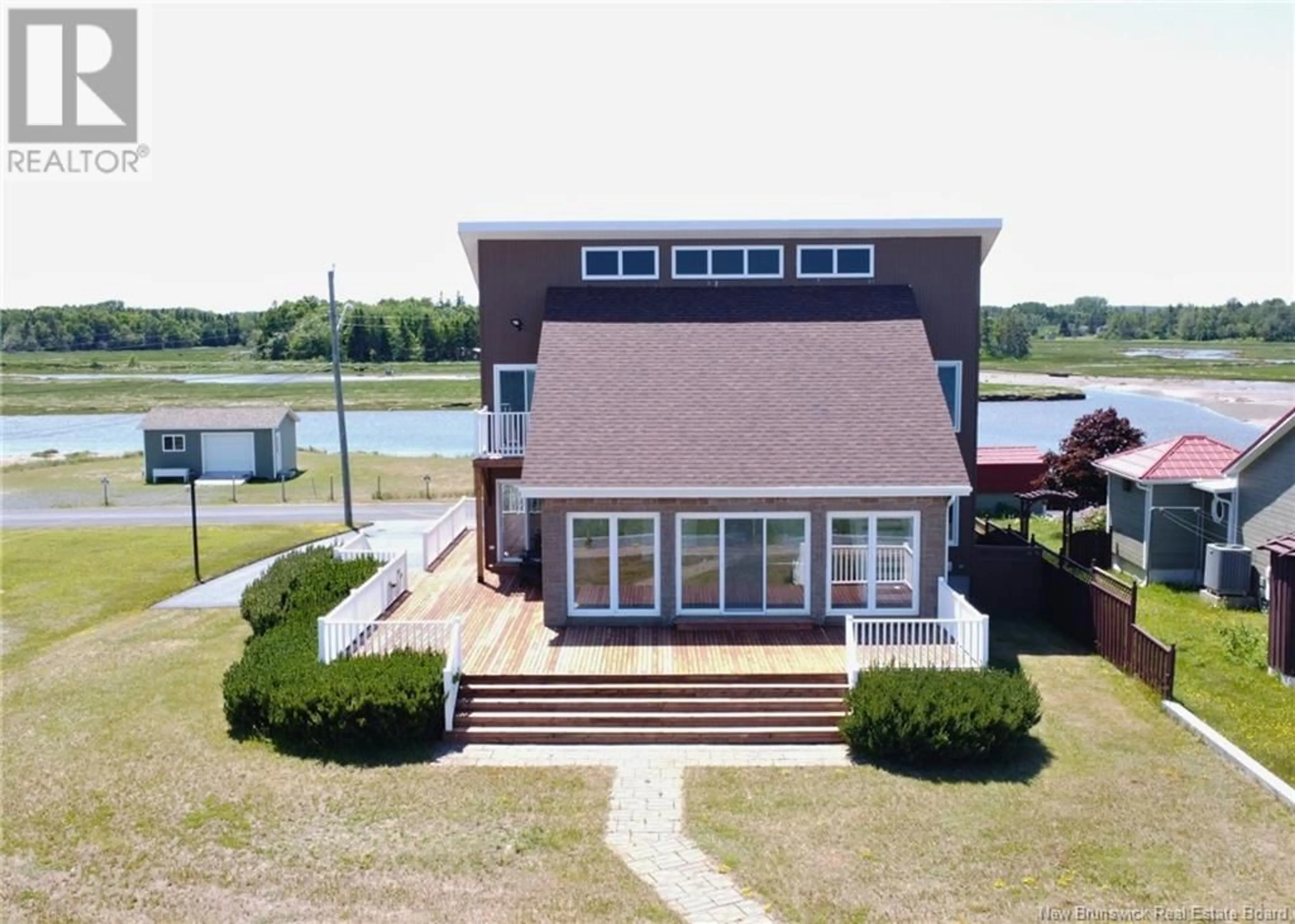 A pic from outside/outdoor area/front of a property/back of a property/a pic from drone, water/lake/river/ocean view for 1057 JACQUES CARTIER STREET, Beresford New Brunswick E8K1A7