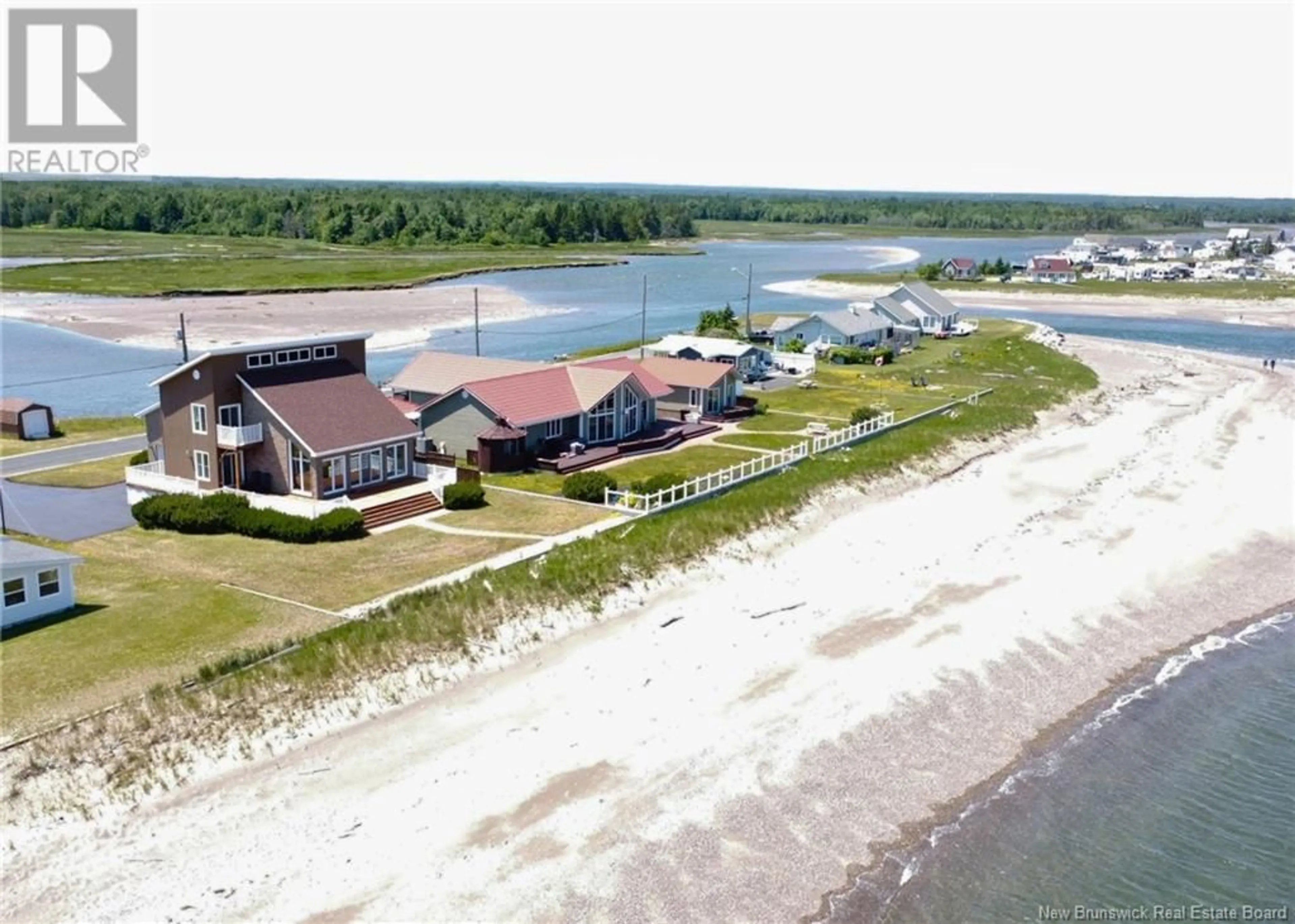 A pic from outside/outdoor area/front of a property/back of a property/a pic from drone, water/lake/river/ocean view for 1057 JACQUES CARTIER STREET, Beresford New Brunswick E8K1A7