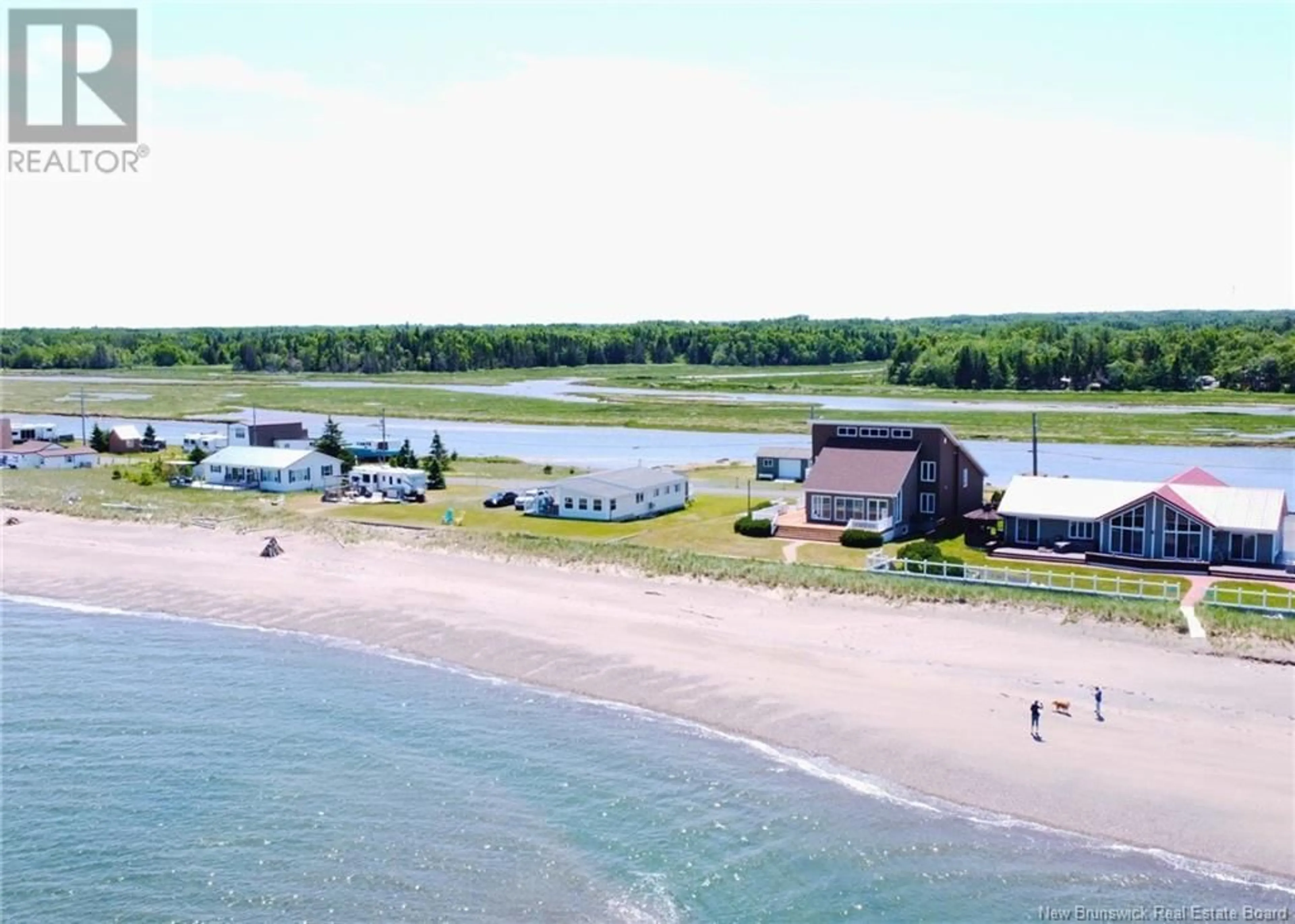 A pic from outside/outdoor area/front of a property/back of a property/a pic from drone, water/lake/river/ocean view for 1057 JACQUES CARTIER STREET, Beresford New Brunswick E8K1A7