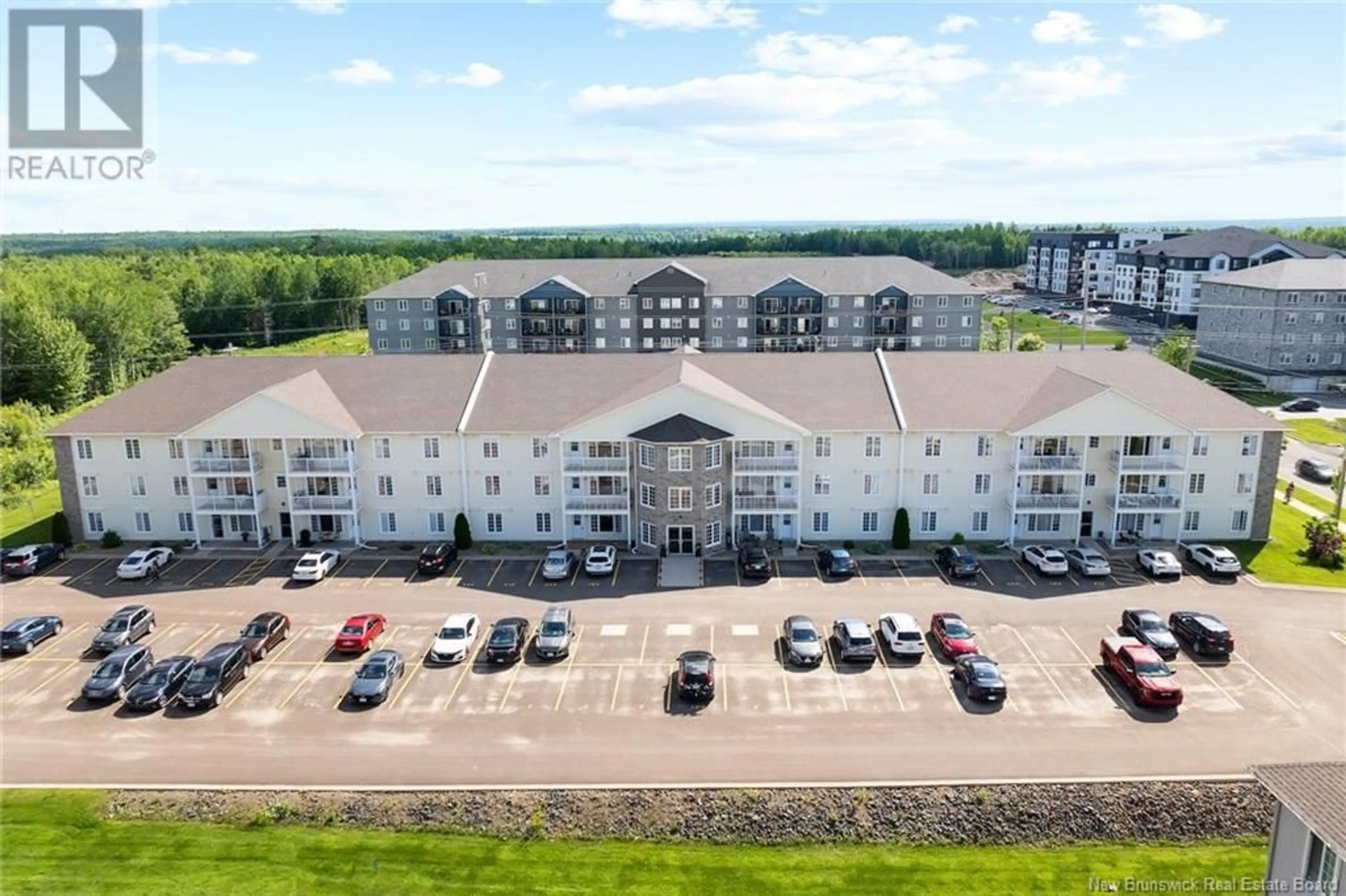 A pic from outside/outdoor area/front of a property/back of a property/a pic from drone, building for 112 - 130 LIAN STREET, Fredericton New Brunswick E3C0G4