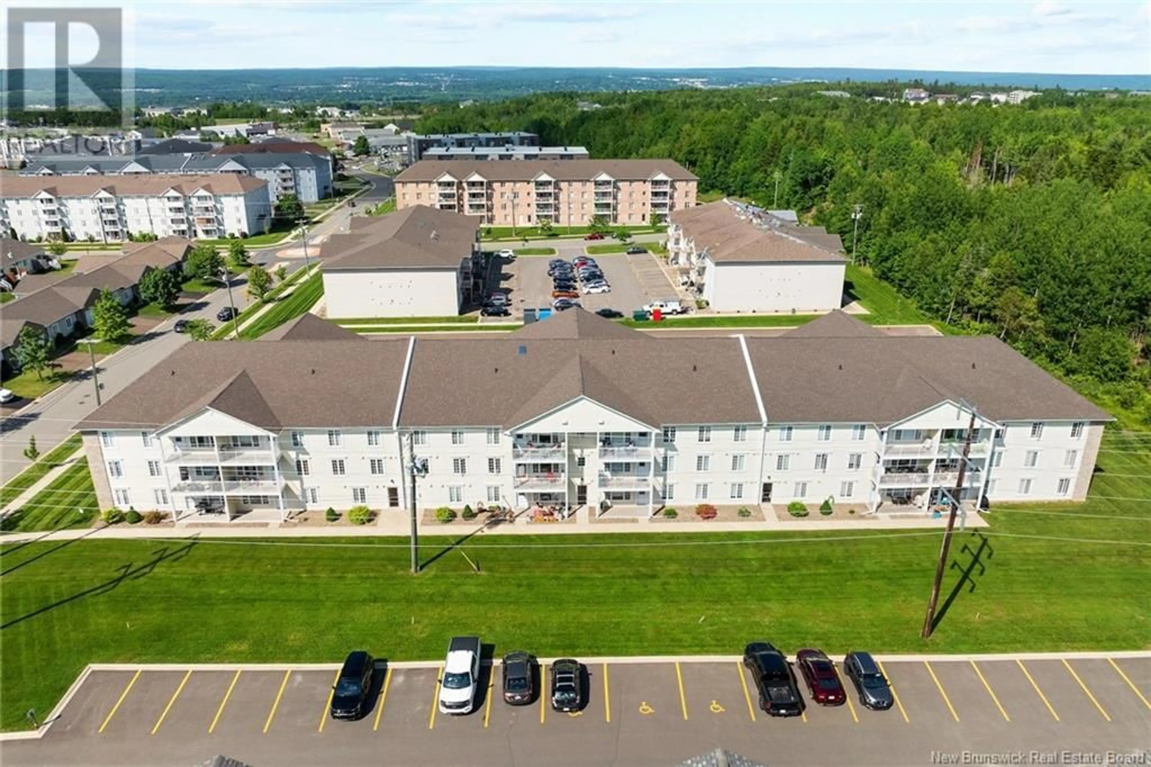 A pic from outside/outdoor area/front of a property/back of a property/a pic from drone, building for 112 - 130 LIAN STREET, Fredericton New Brunswick E3C0G4