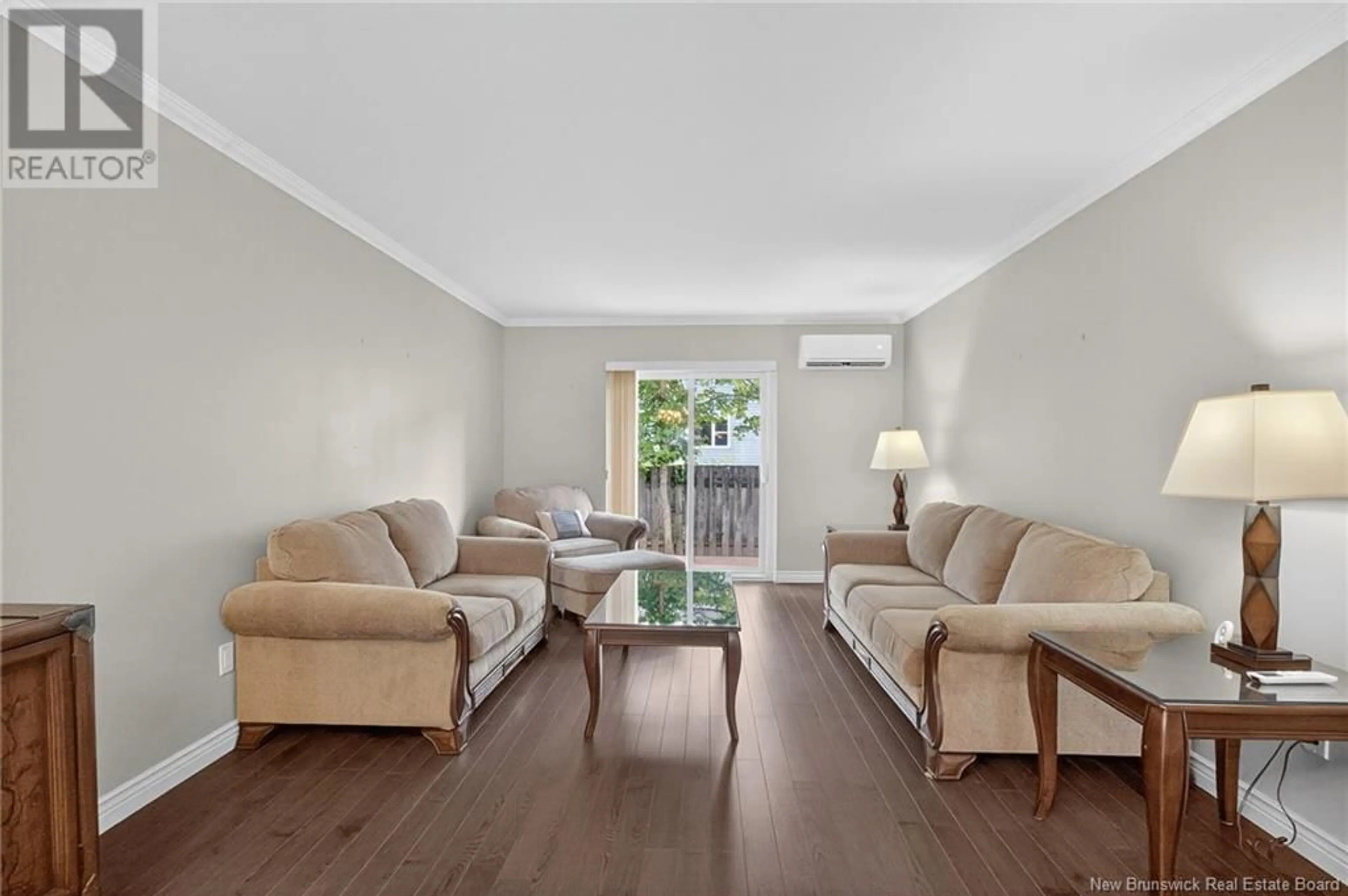 Living room with furniture, wood/laminate floor for 8 - 331 MCLAUGHLIN DRIVE, Moncton New Brunswick E1A4R3