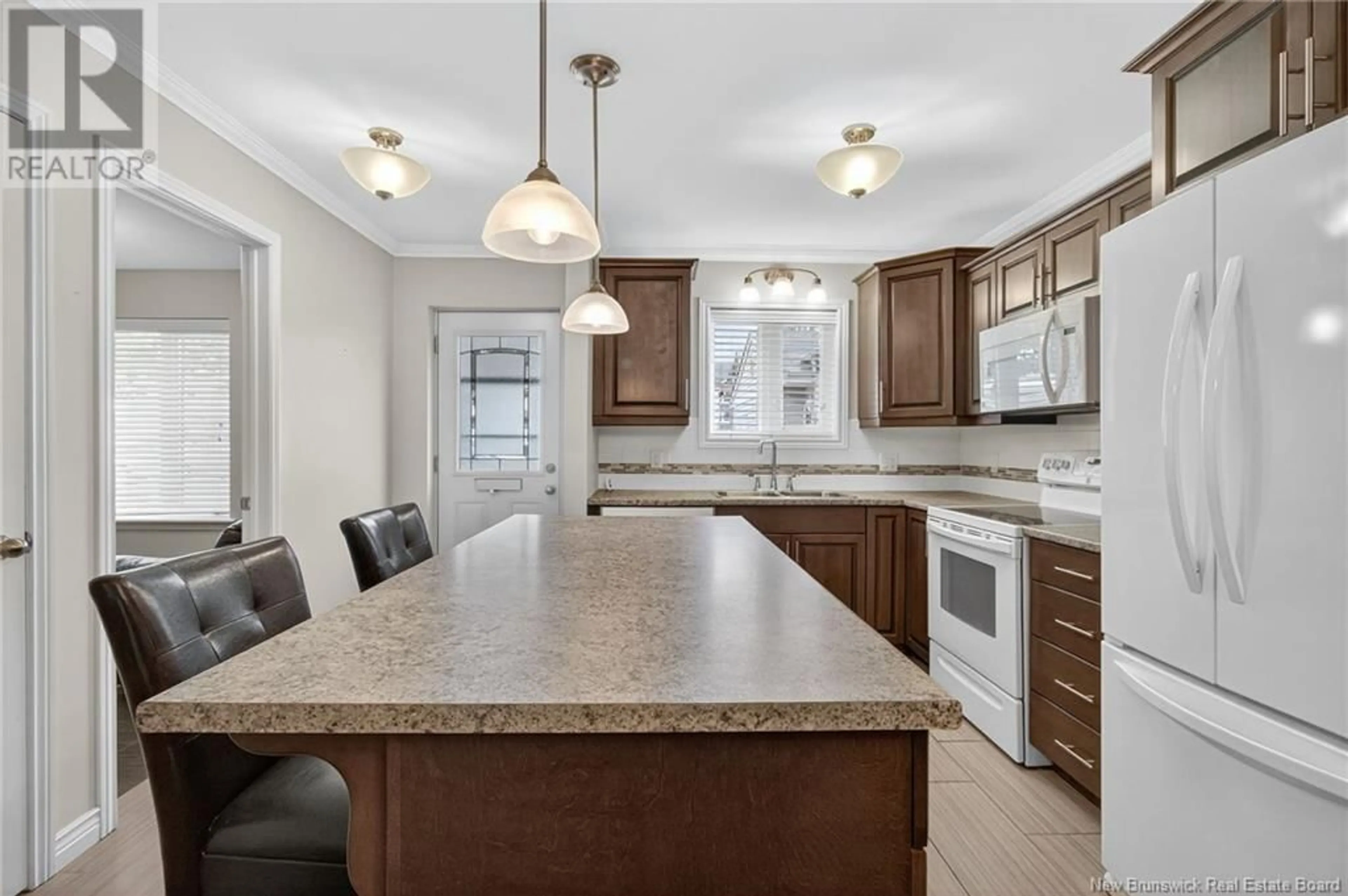 Open concept kitchen, ceramic/tile floor for 8 - 331 MCLAUGHLIN DRIVE, Moncton New Brunswick E1A4R3
