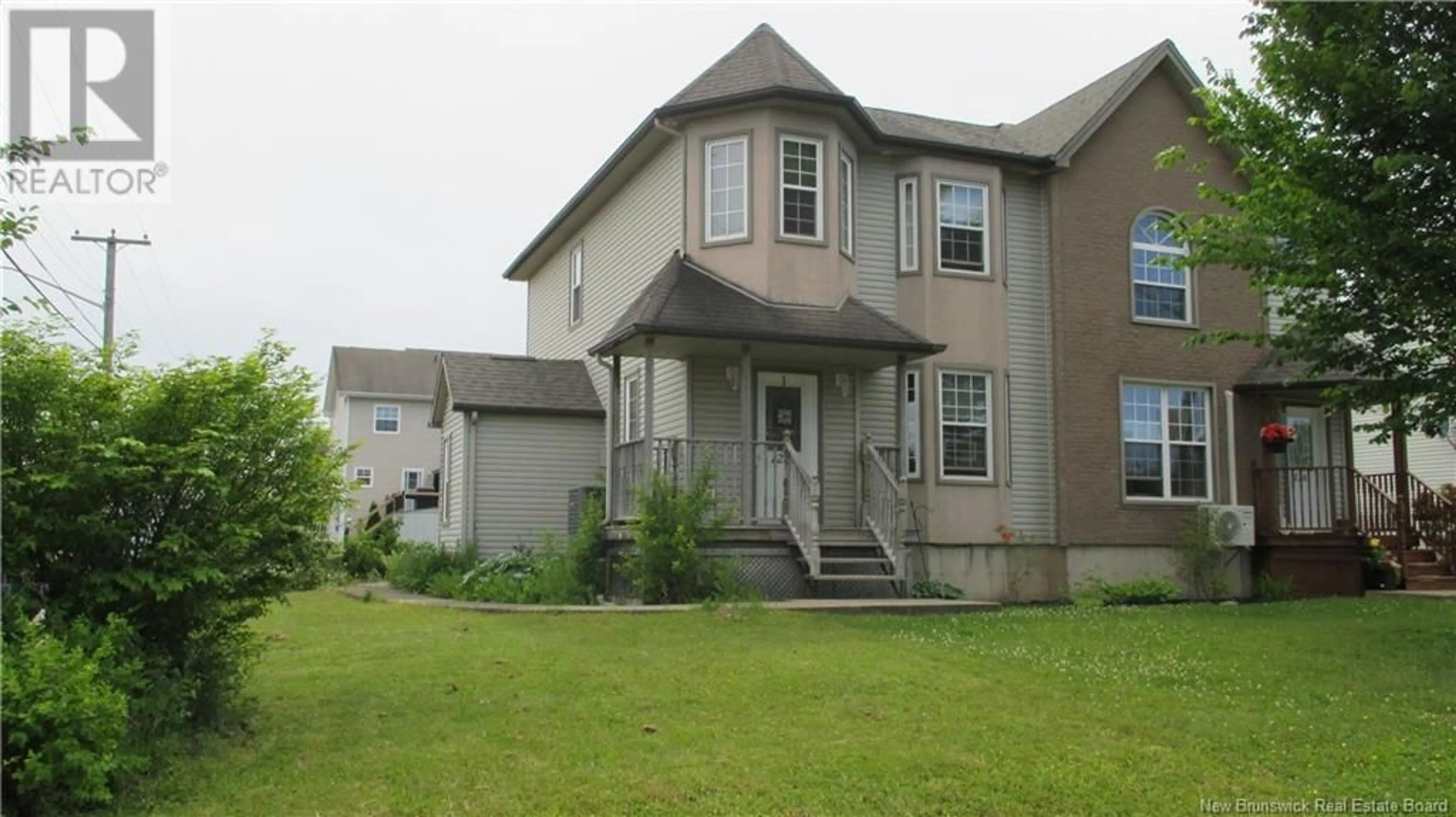 Home with vinyl exterior material, street for 124 RENNICK ROAD, Moncton New Brunswick E1G4X2
