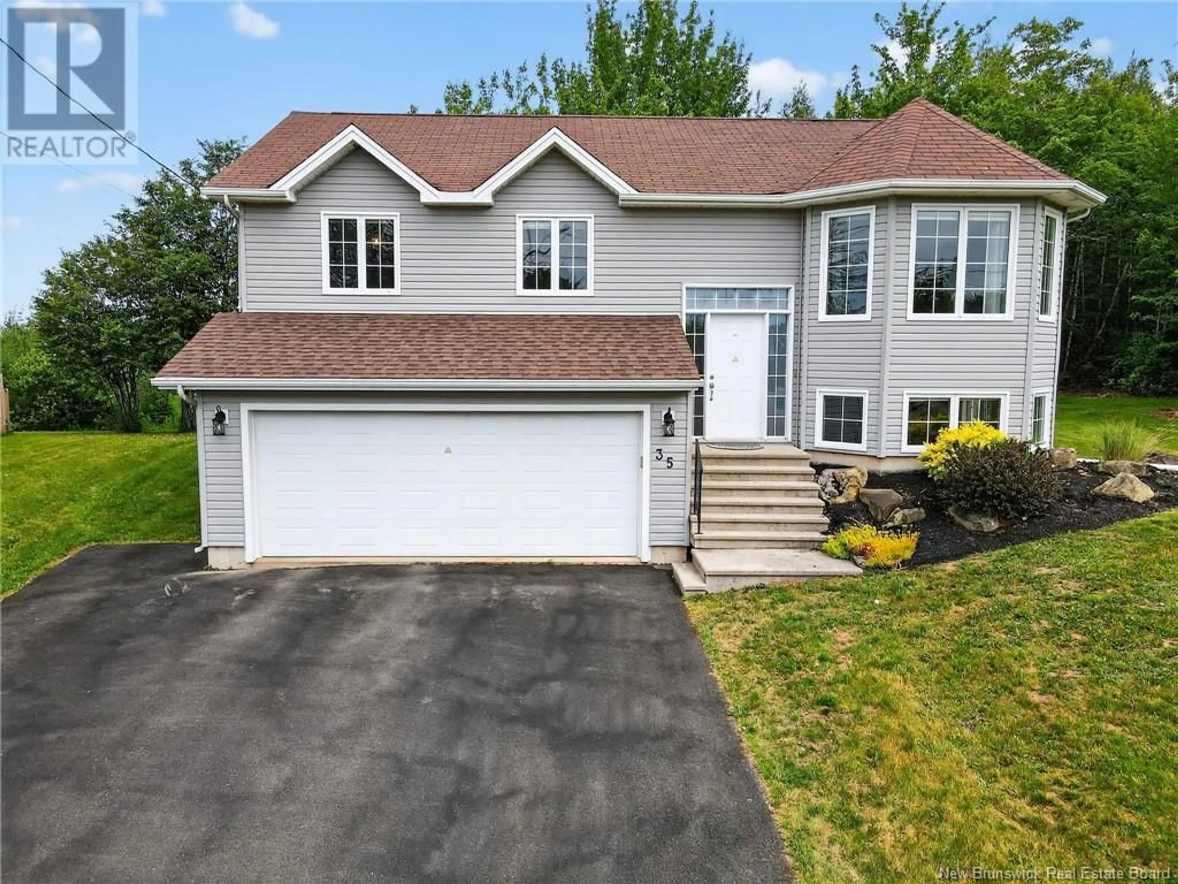 Home with vinyl exterior material, street for 35 HERMAN, Dieppe New Brunswick E4K3Y5