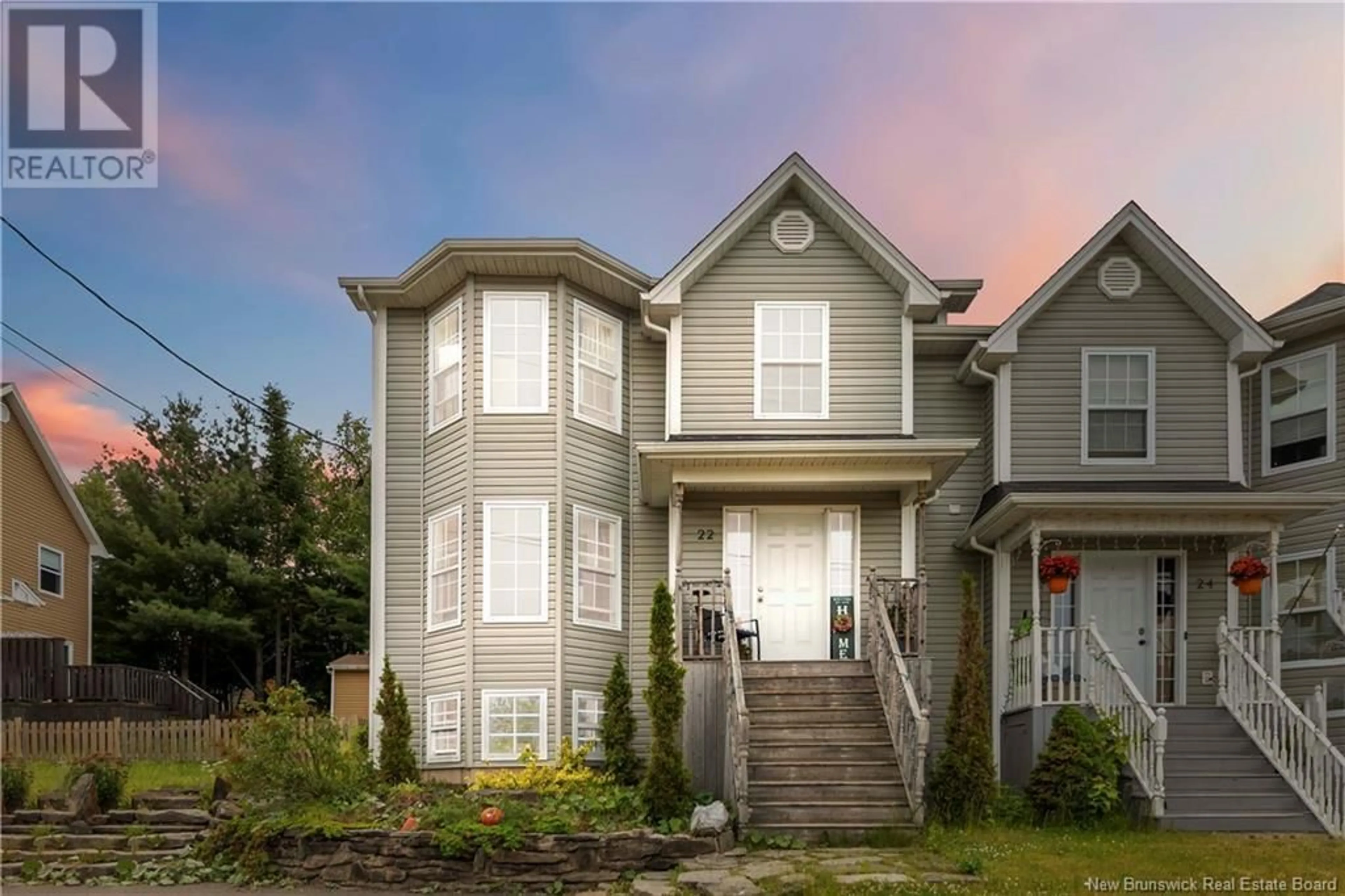 Home with vinyl exterior material, street for 22 RUE CHIANTI, Dieppe New Brunswick E1A4H8