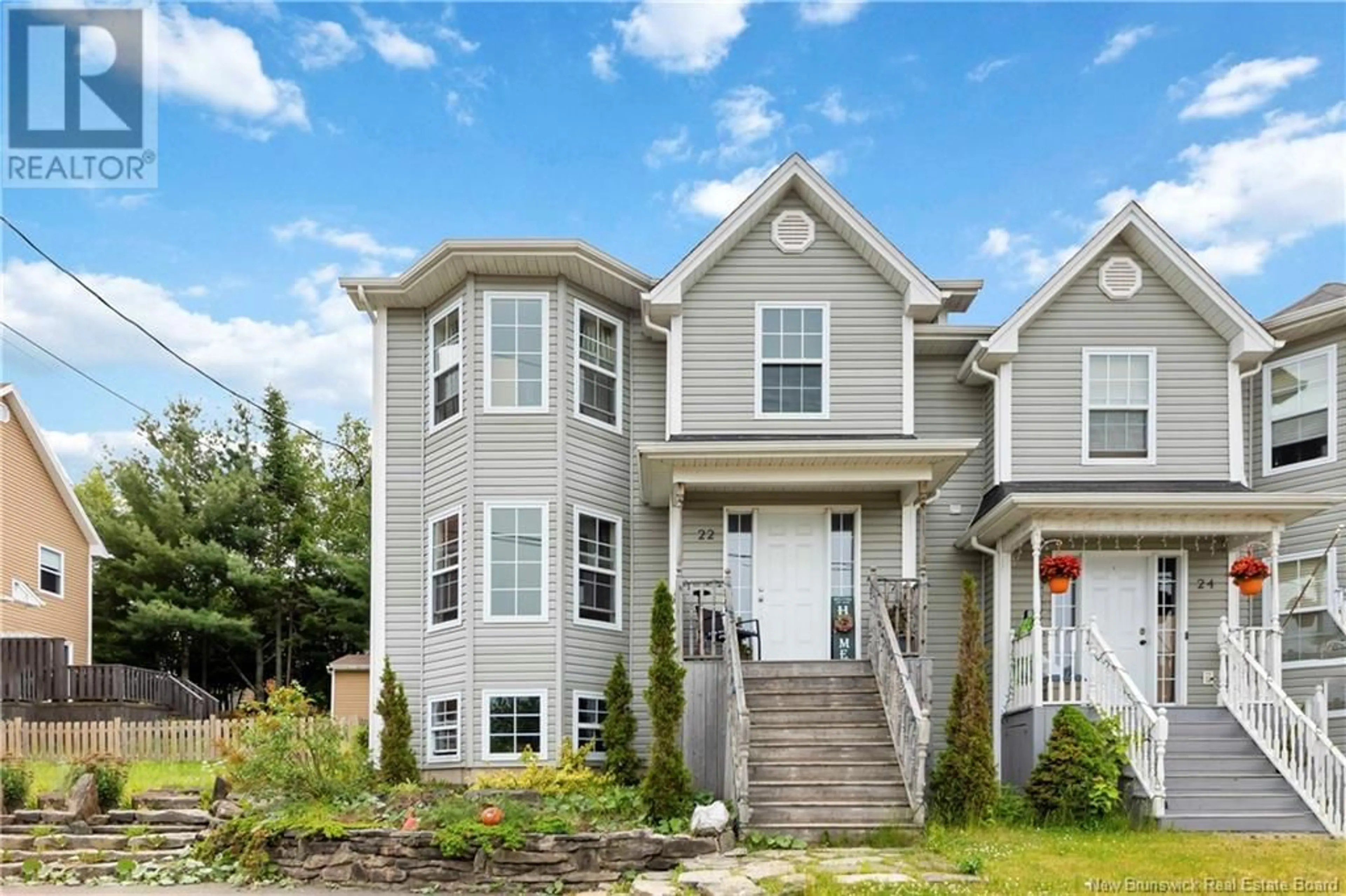Home with vinyl exterior material, street for 22 RUE CHIANTI, Dieppe New Brunswick E1A4H8