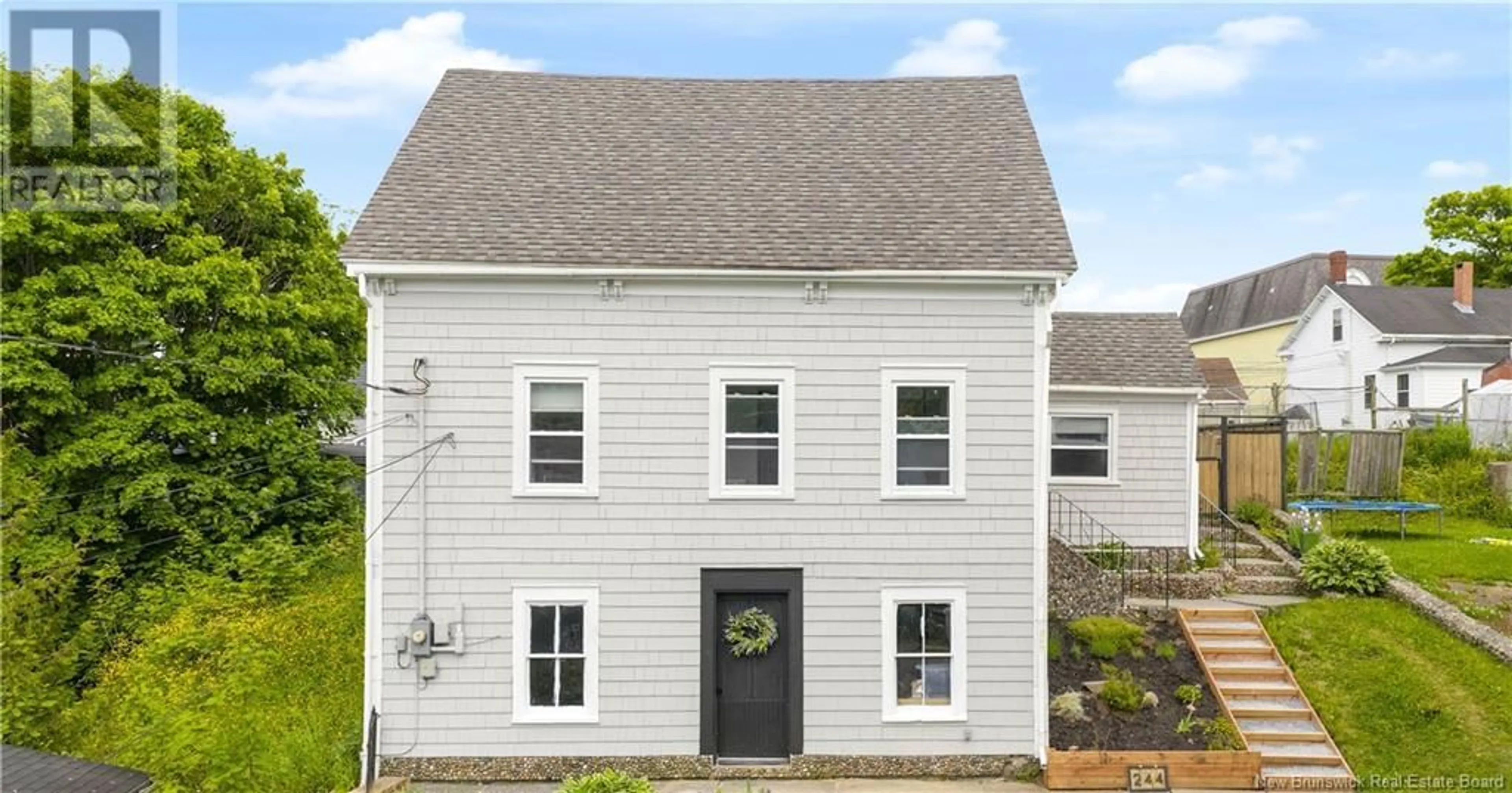 Home with vinyl exterior material, street for 244 RODNEY STREET, Saint John New Brunswick E2M1X6
