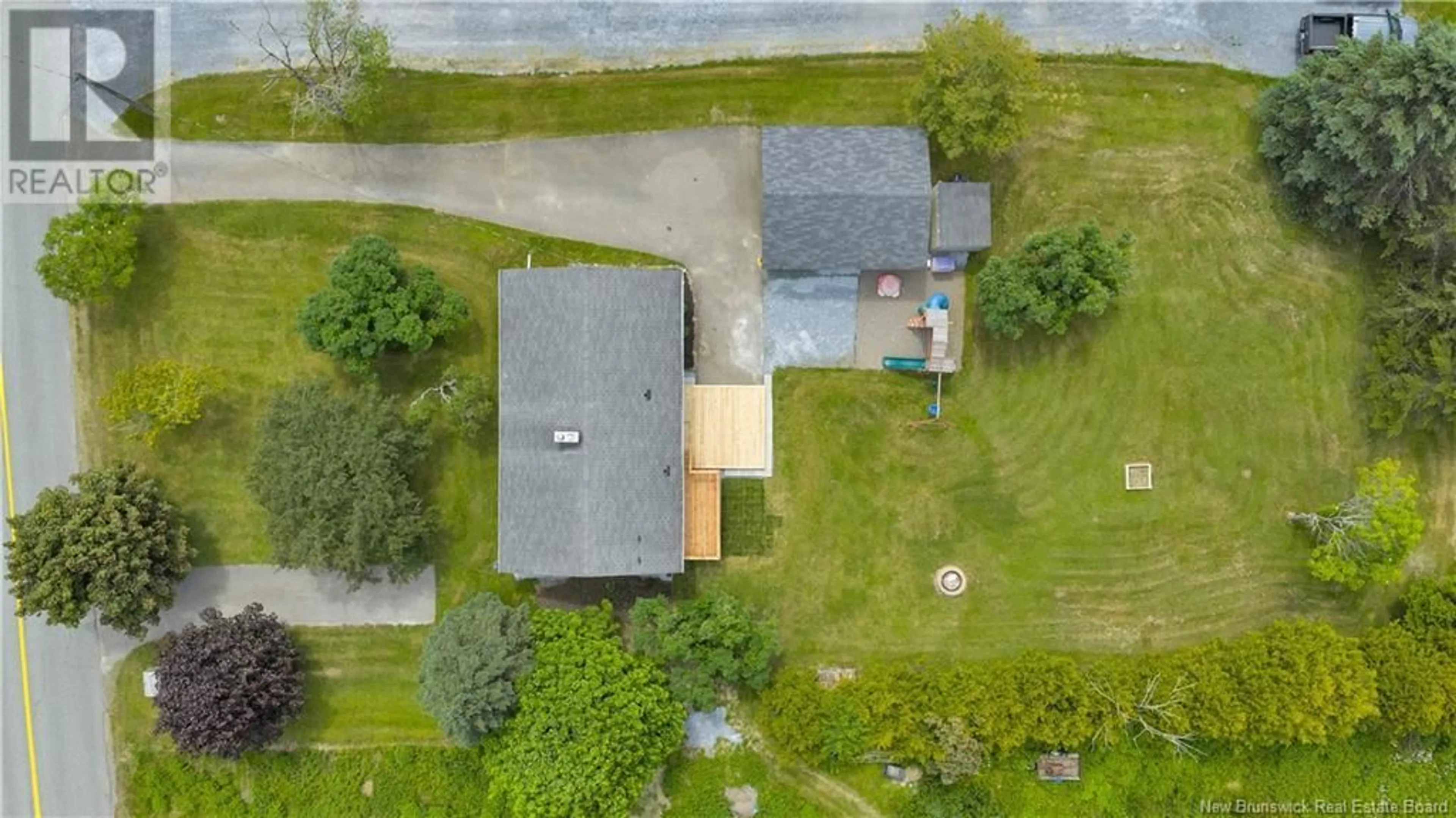 A pic from outside/outdoor area/front of a property/back of a property/a pic from drone, street for 1950 RED HEAD ROAD, Saint John New Brunswick E2P1L2